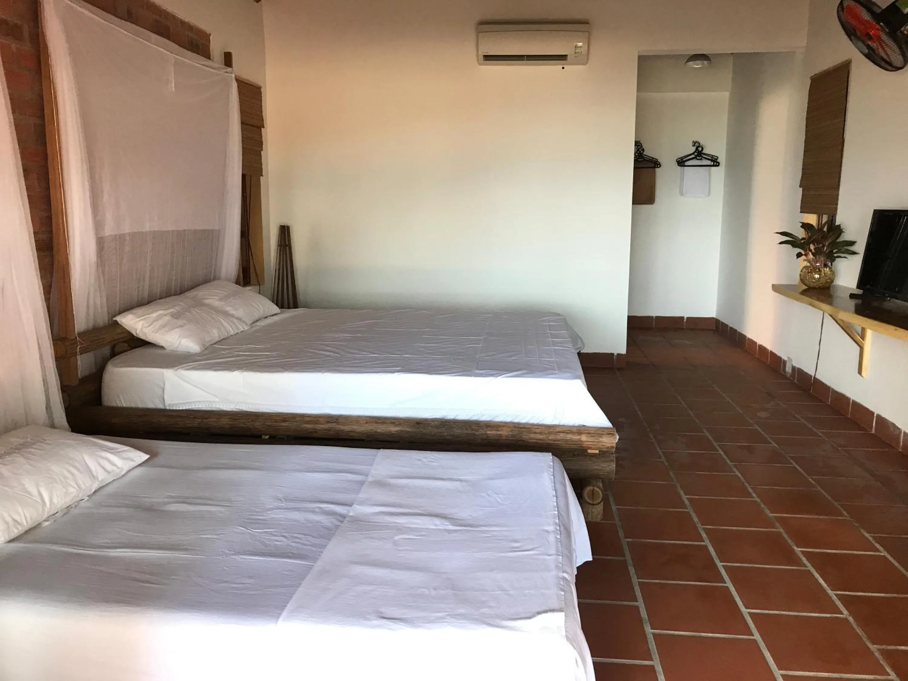 Photo of the whole room, Bed in Phu Quoc Kim 2 Beach Front Resort