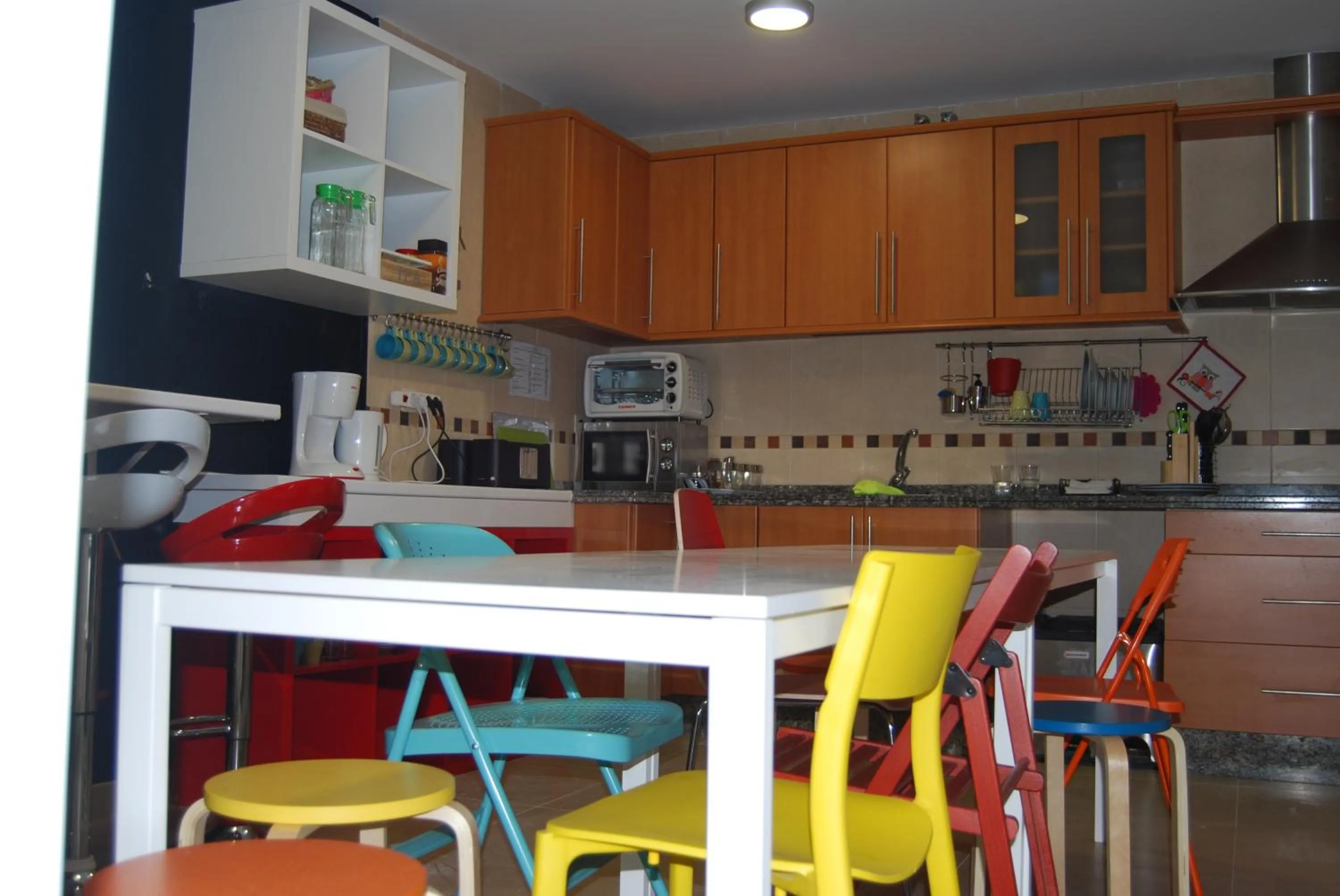 Communal kitchen in Oh! My Hostel