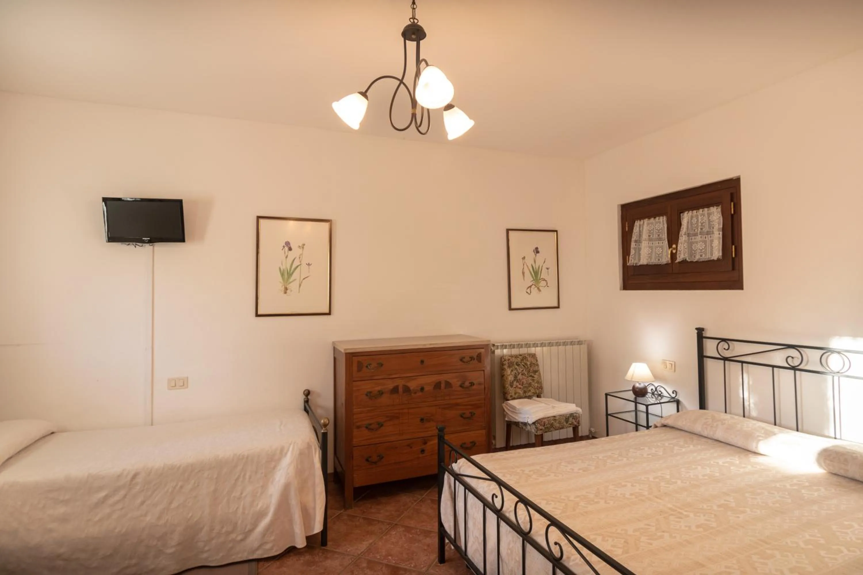 Photo of the whole room, Bed in Agriturismo Sasso Rosso