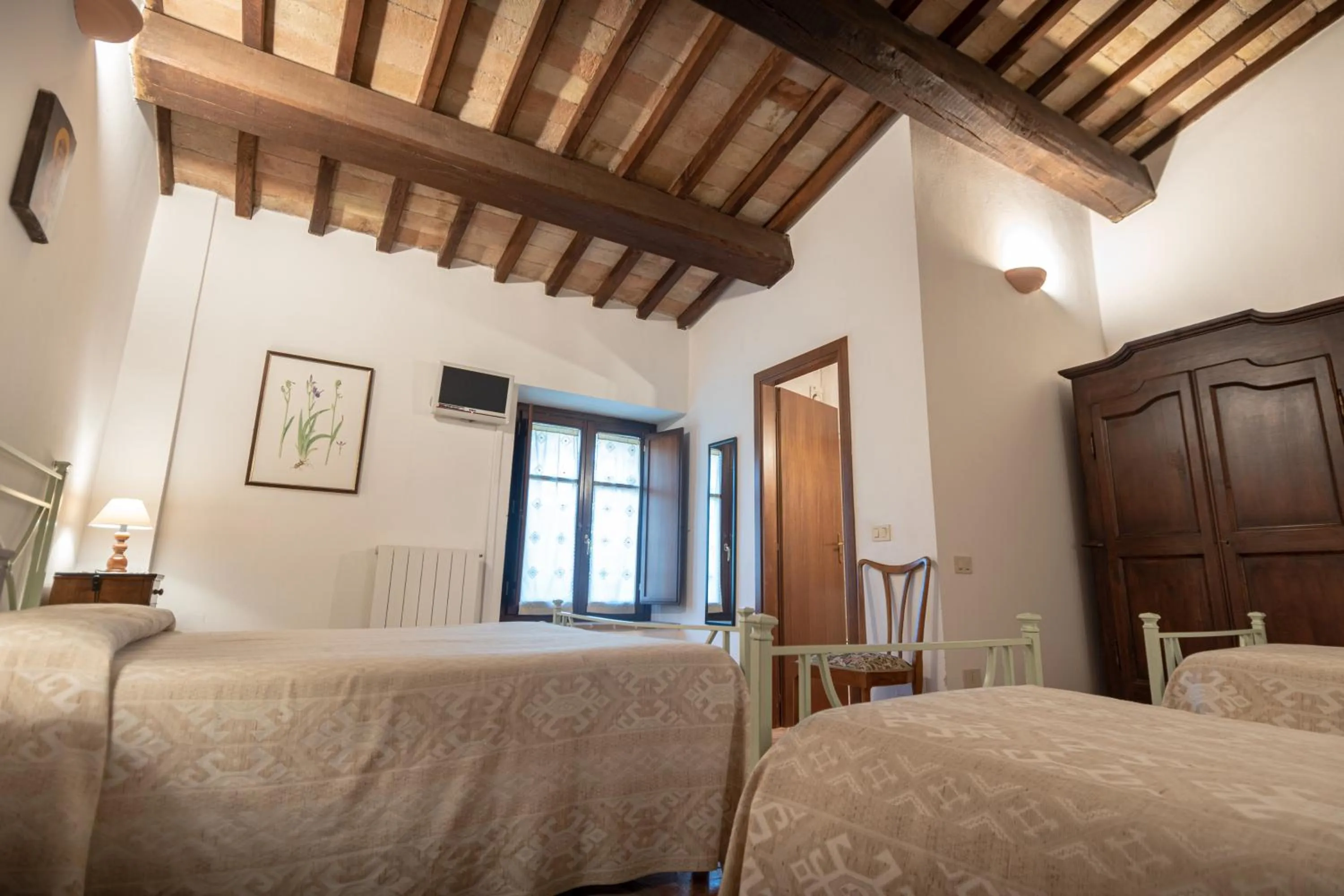 Photo of the whole room, Bed in Agriturismo Sasso Rosso