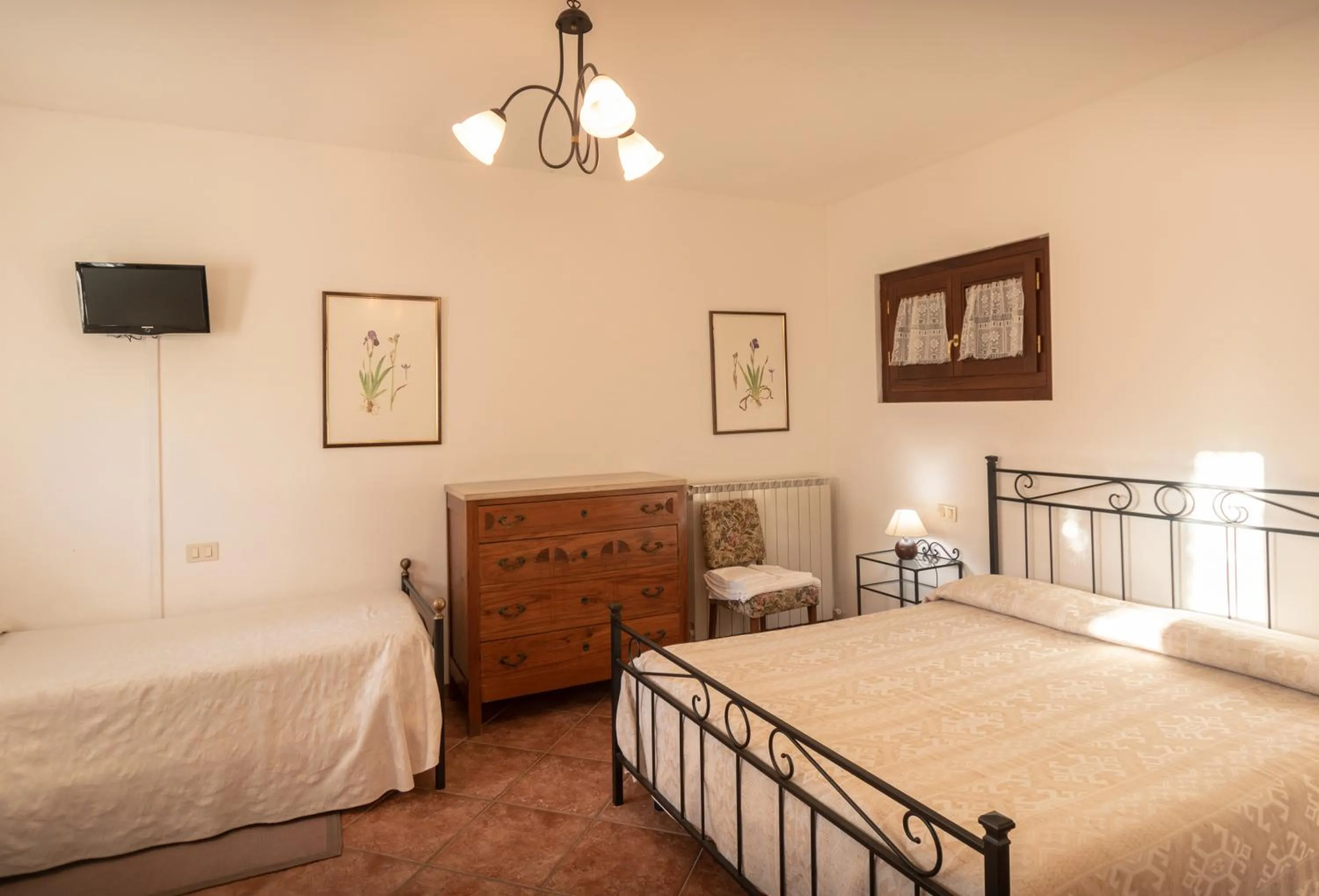 Photo of the whole room, Bed in Agriturismo Sasso Rosso