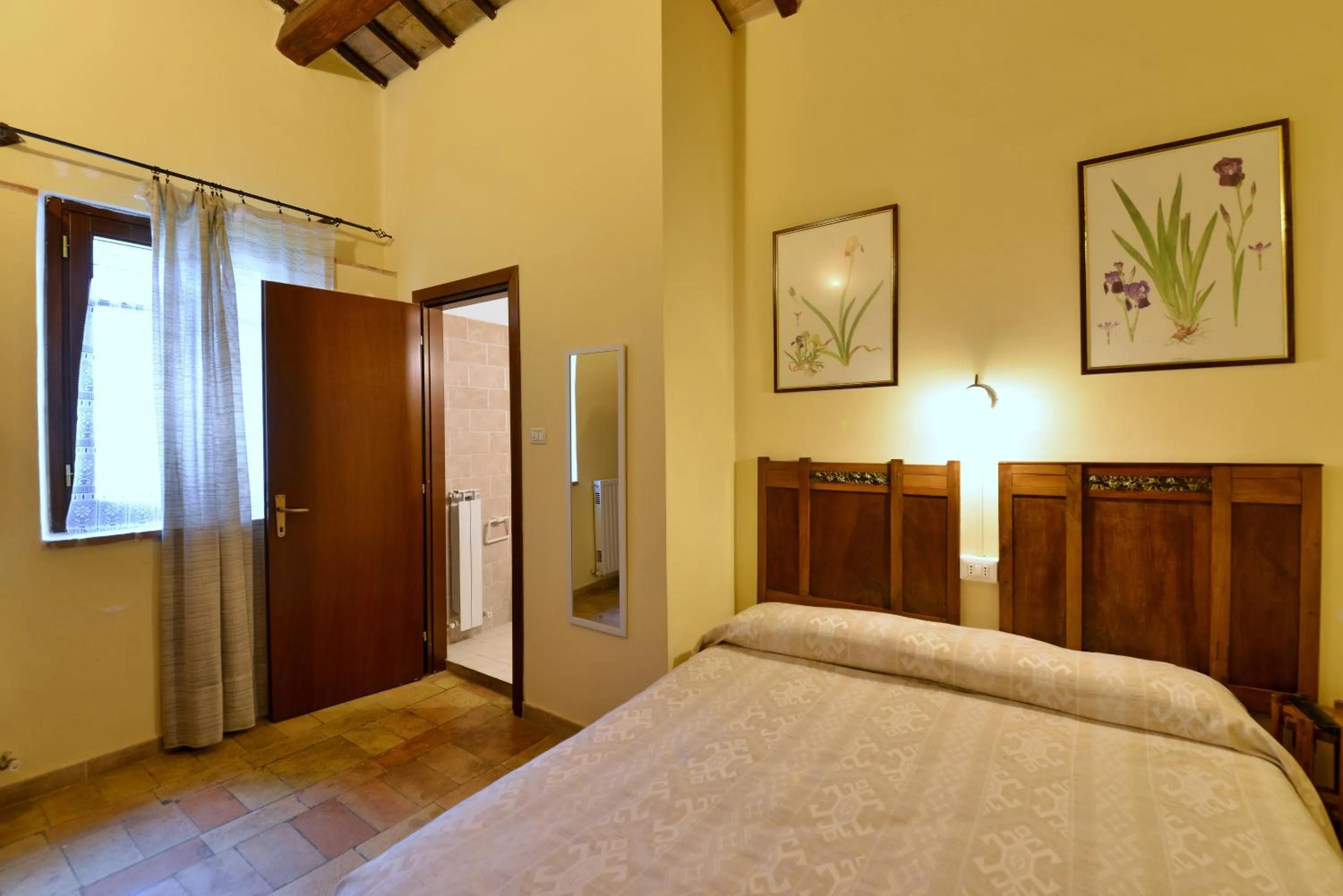 Bed in Agriturismo Sasso Rosso