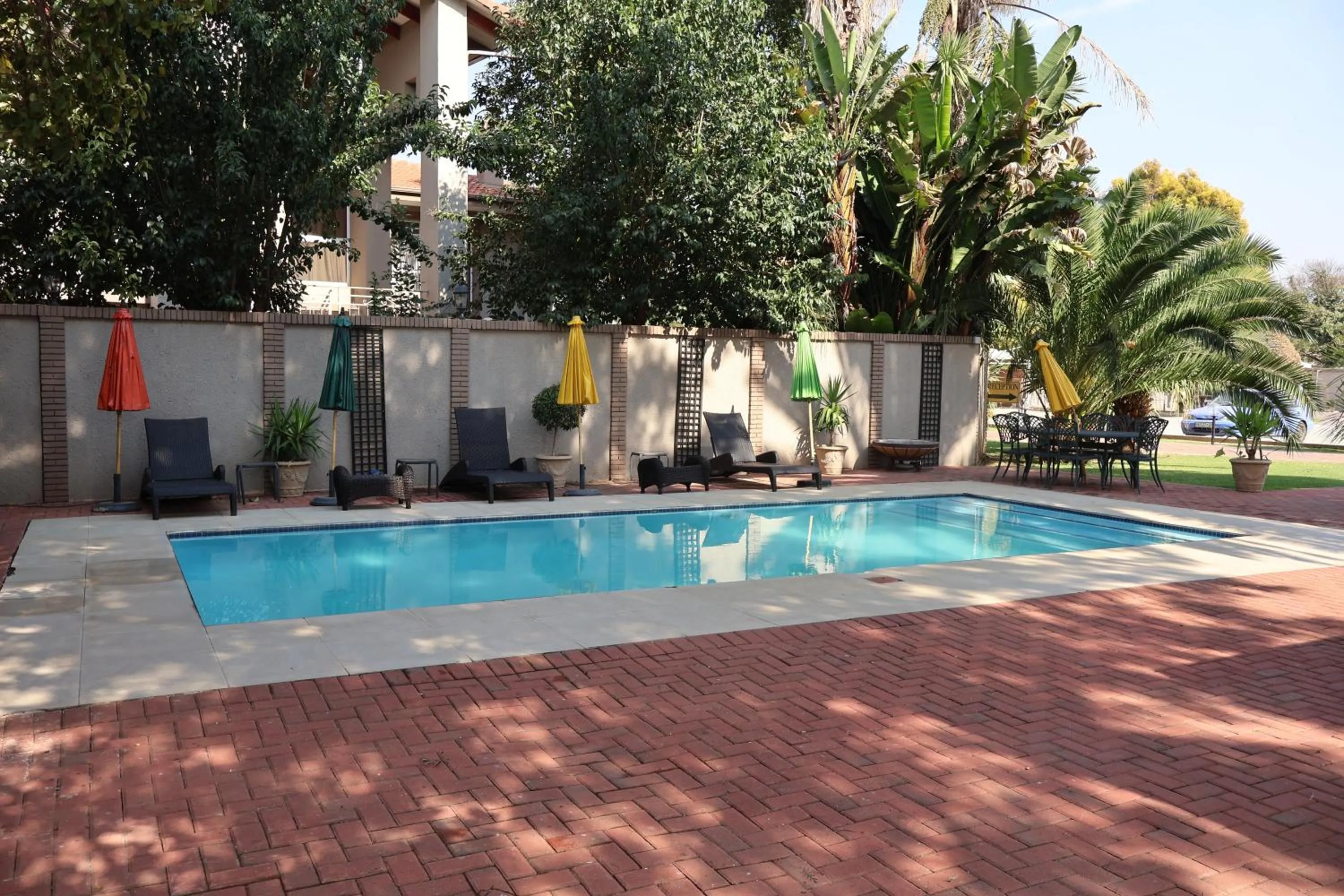 Swimming pool in Airport Gardens Boutique Hotel