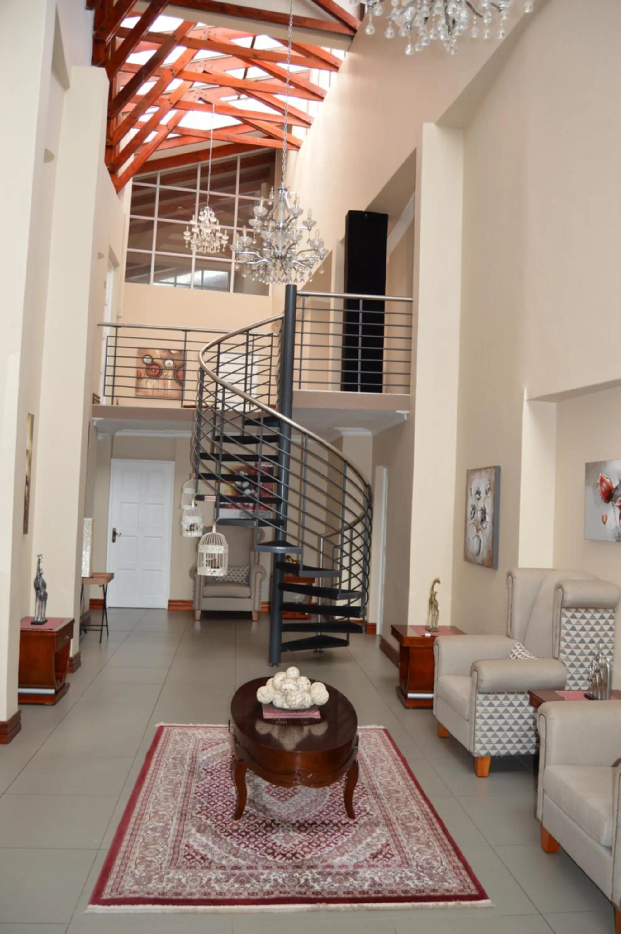 Living room in Airport Gardens Boutique Hotel