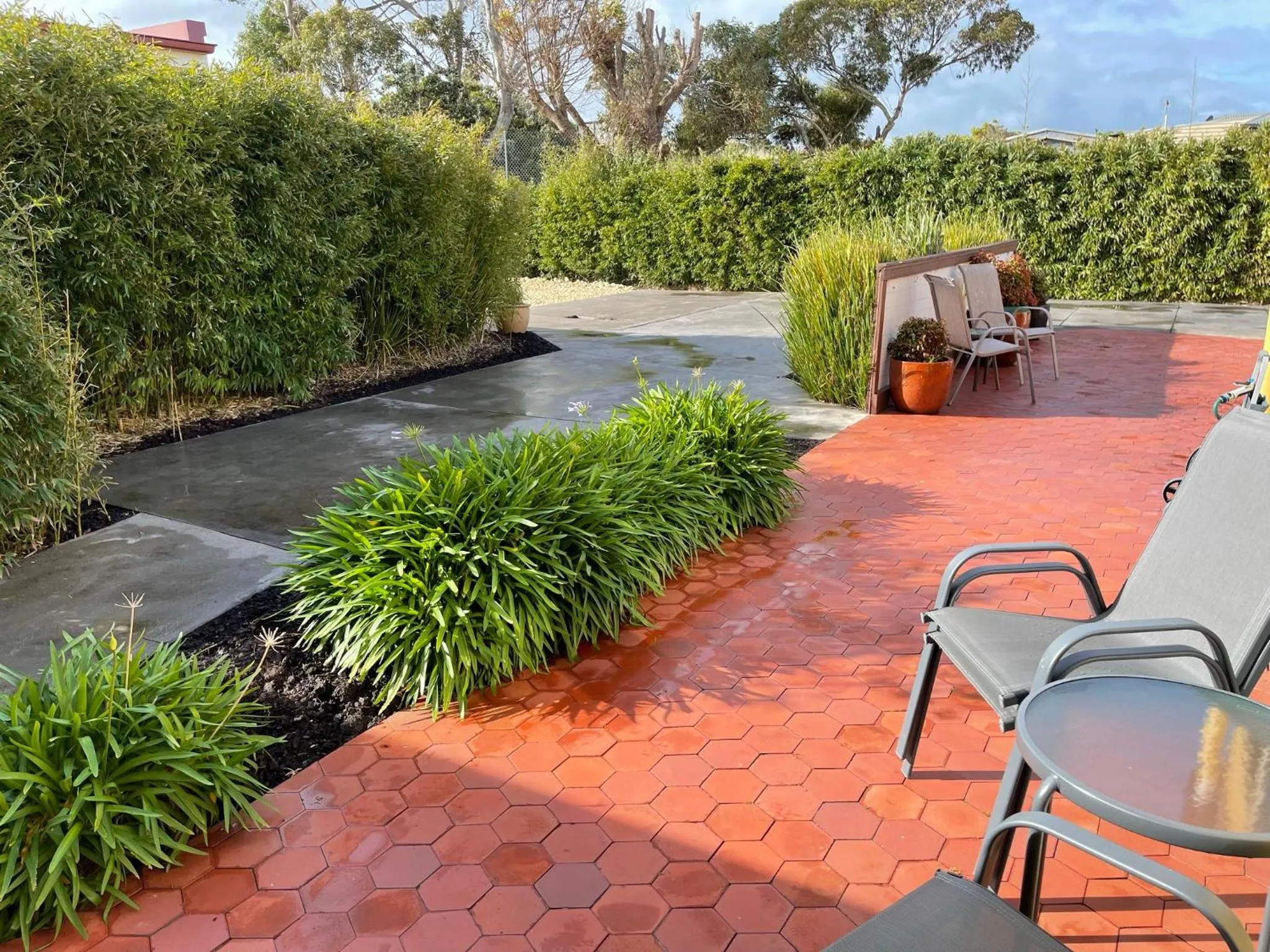 Seating area in Austral Place 88 via Merri River