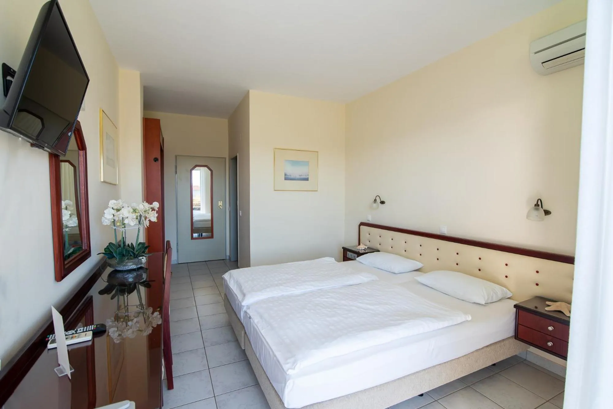 Bed in Dionisos Hotel