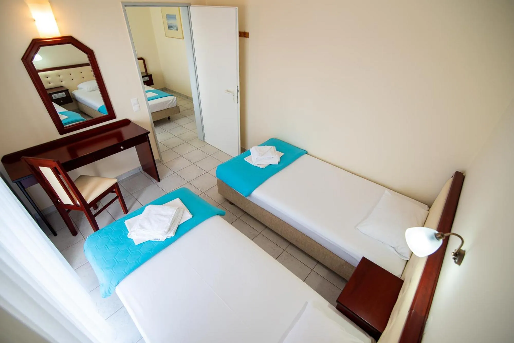 Bed in Dionisos Hotel