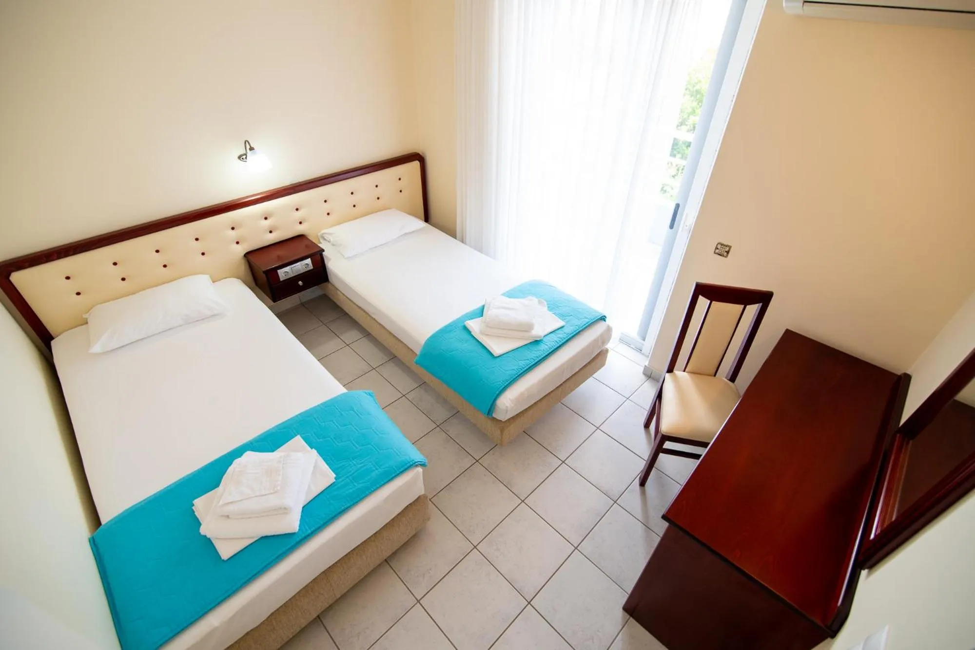 Bed in Dionisos Hotel