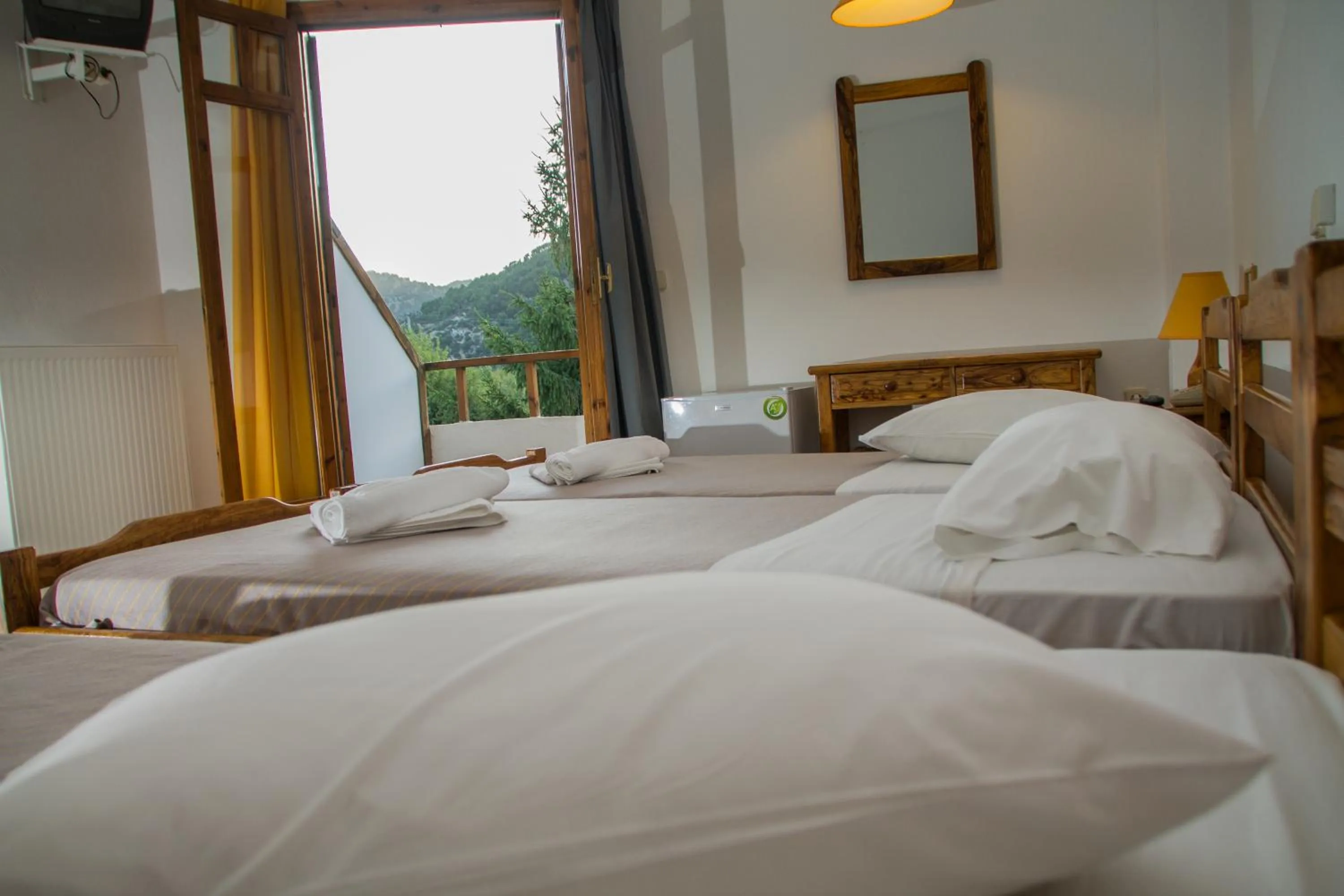 Bedroom, Bed in Neos Omalos Hotel