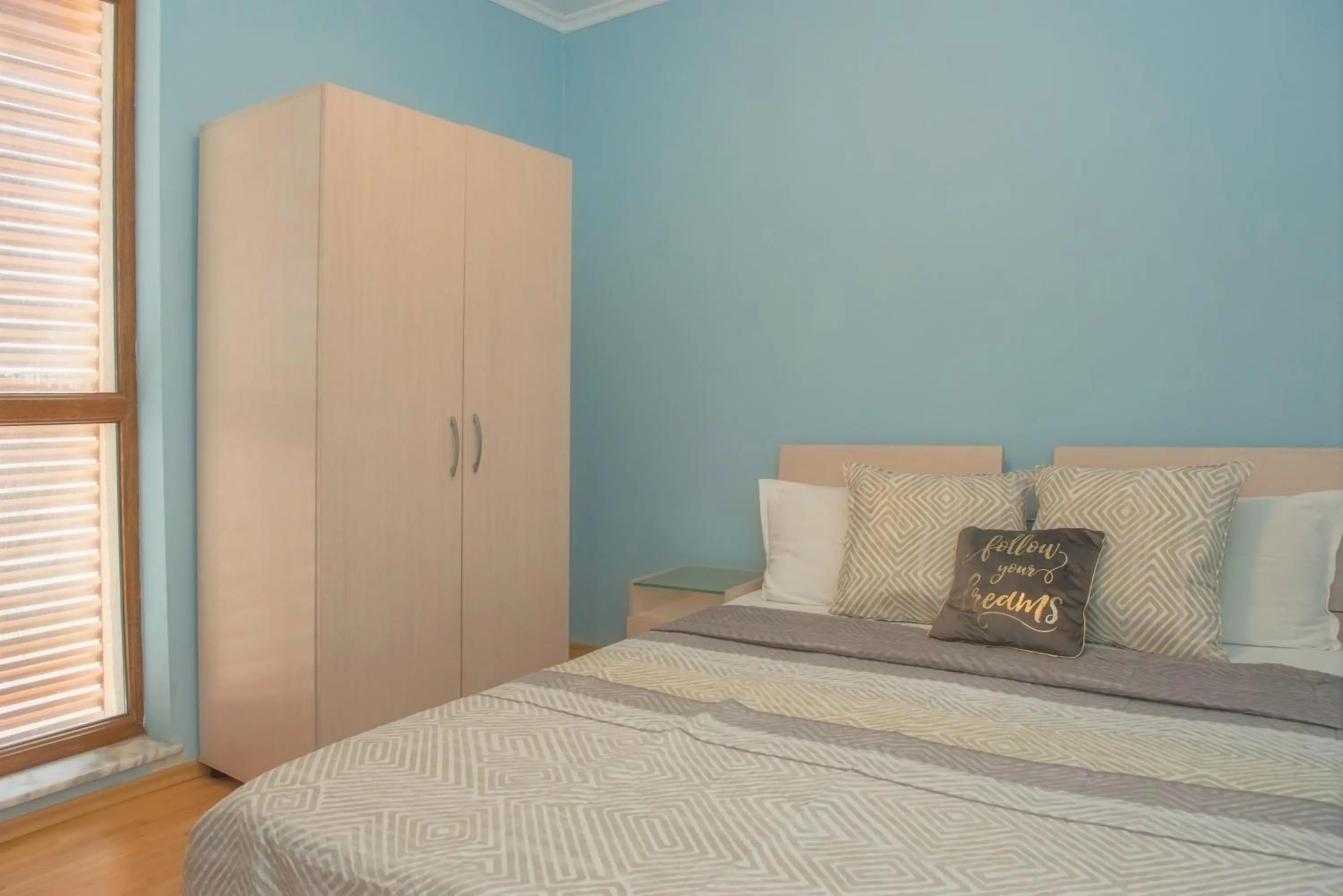 Bed in Sun City I Apartments