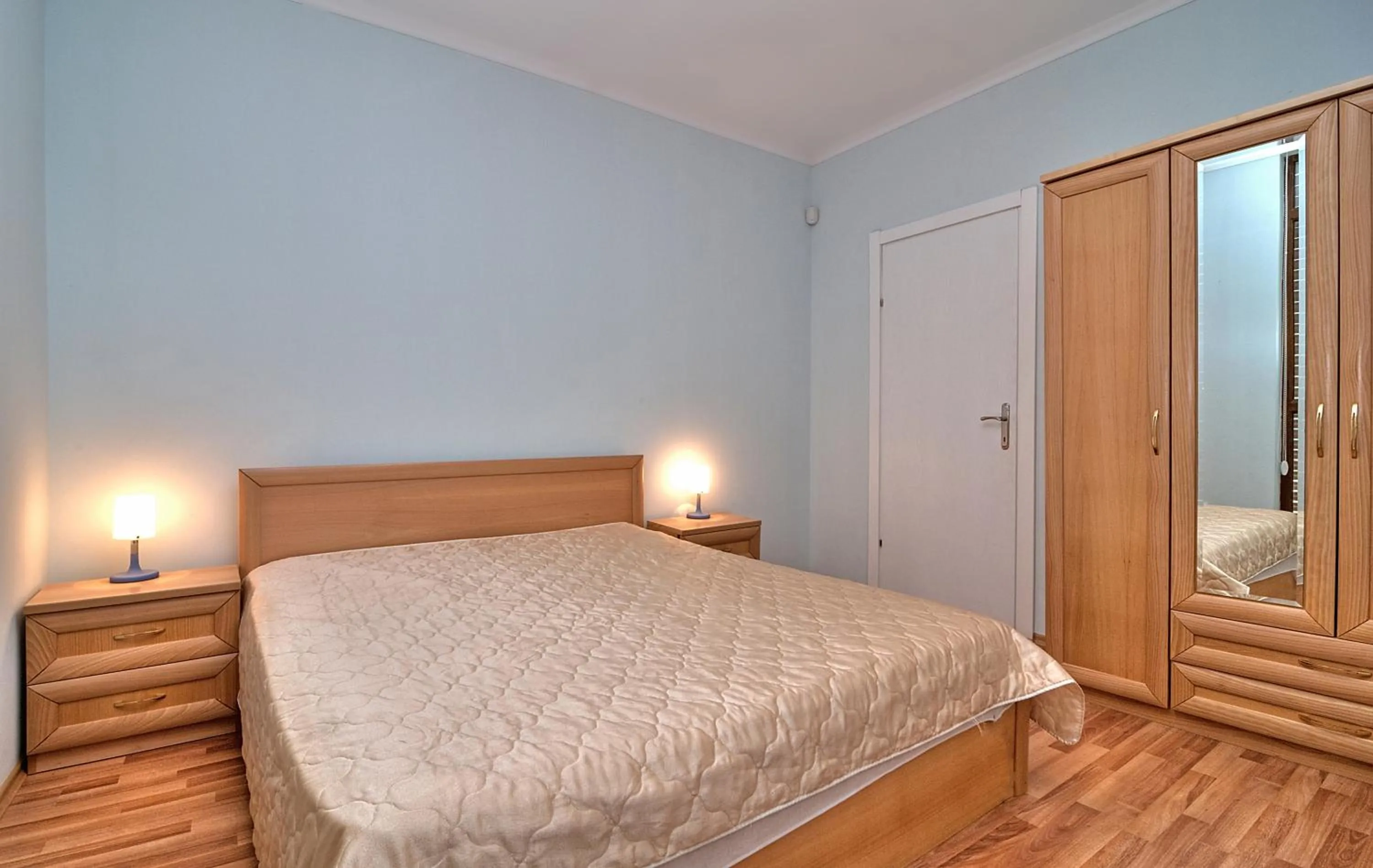 Bed in Sun City I Apartments