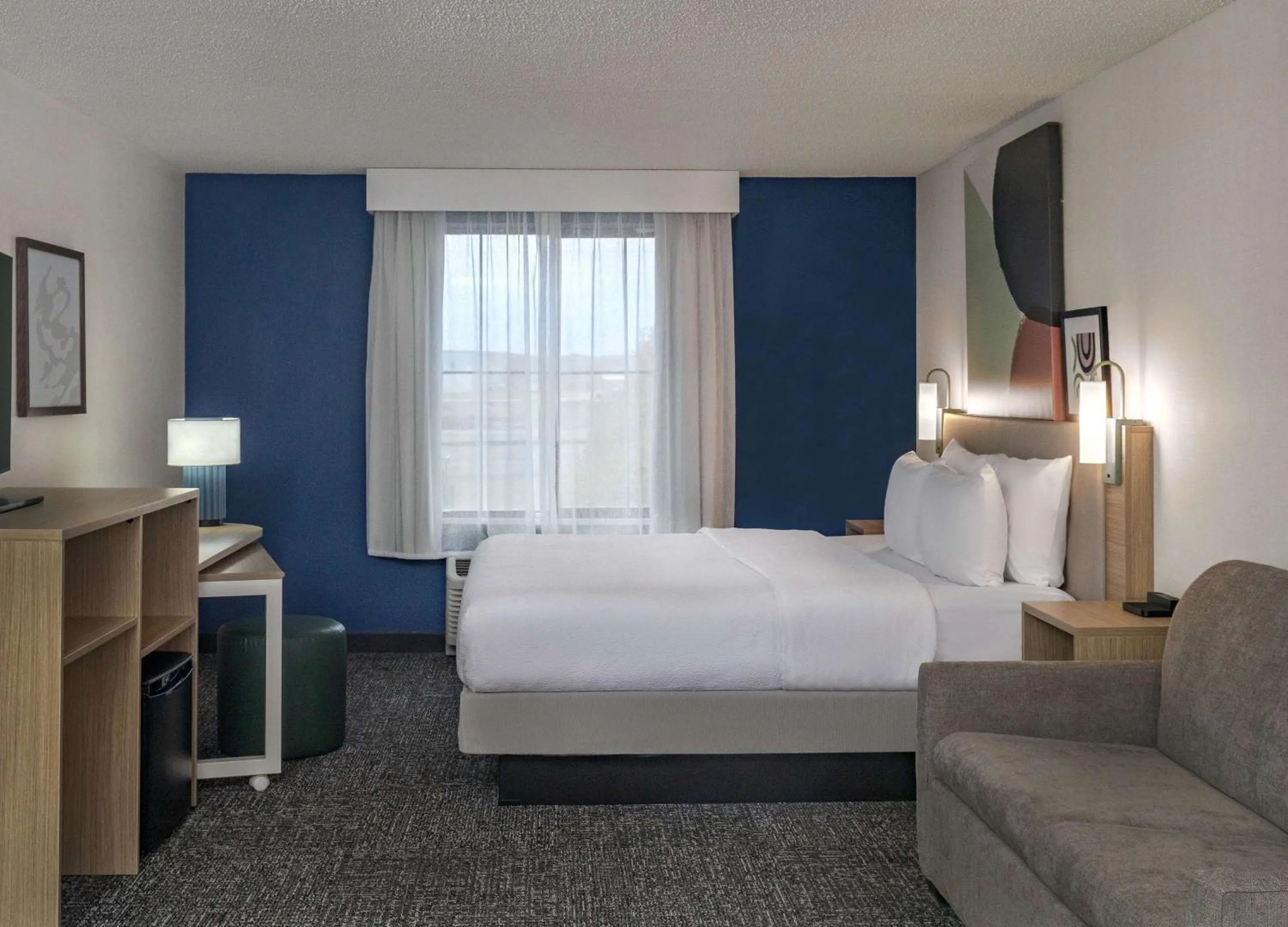 Living room, Bed in Spark by Hilton Denver International Airport