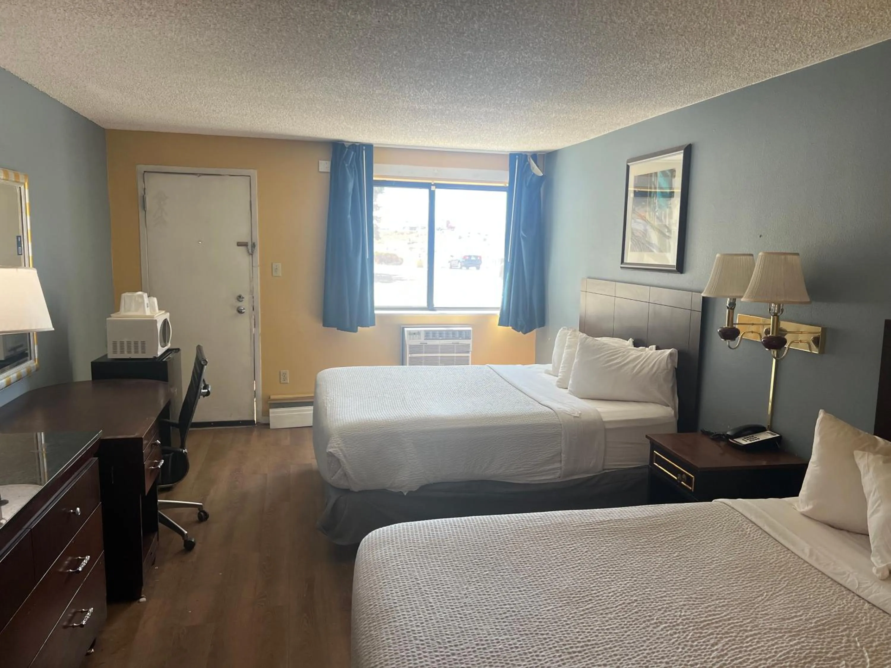 Bed in Studio Lodge Laramie