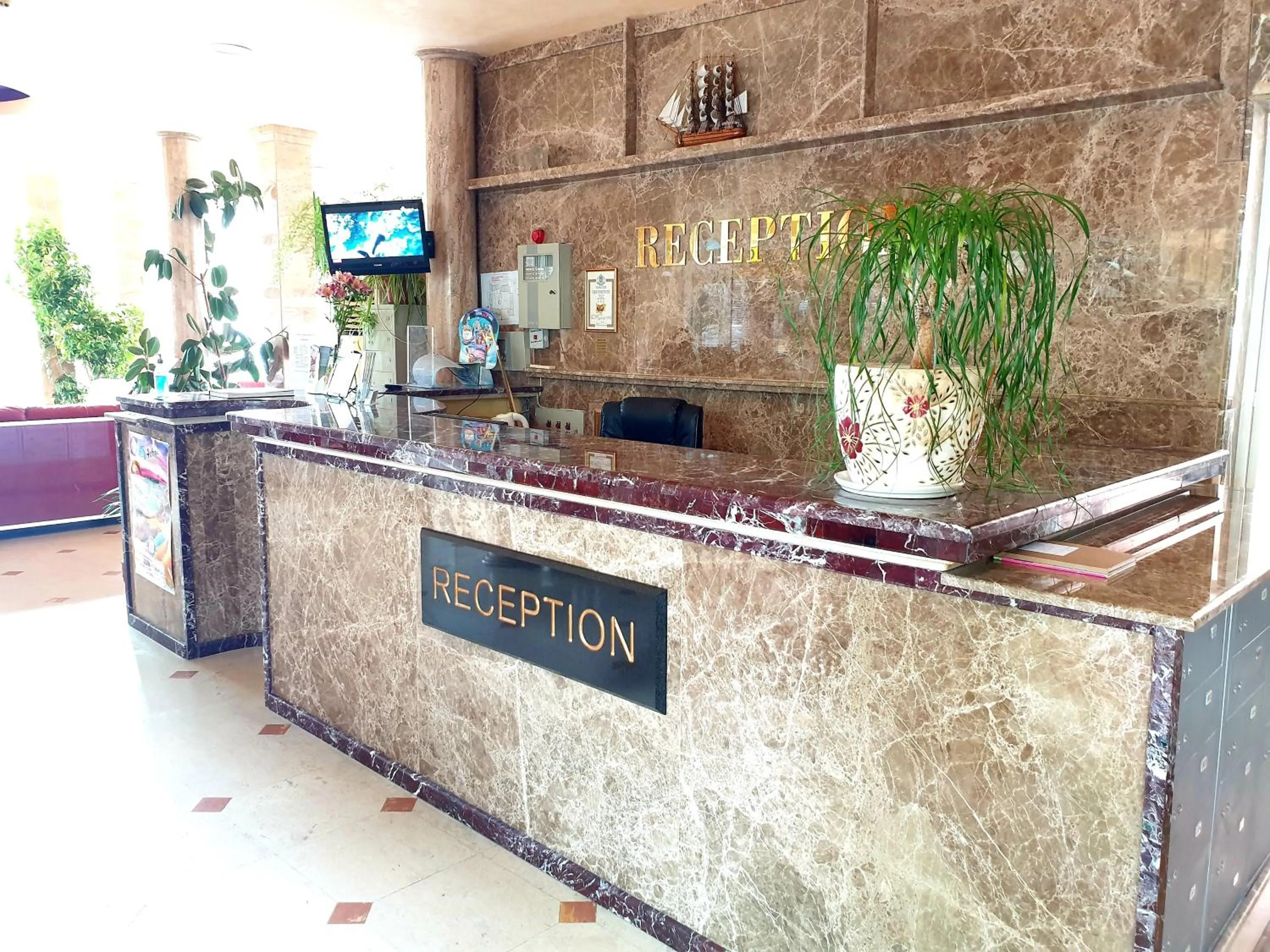 Property logo or sign in Sunny Day Club Hotel