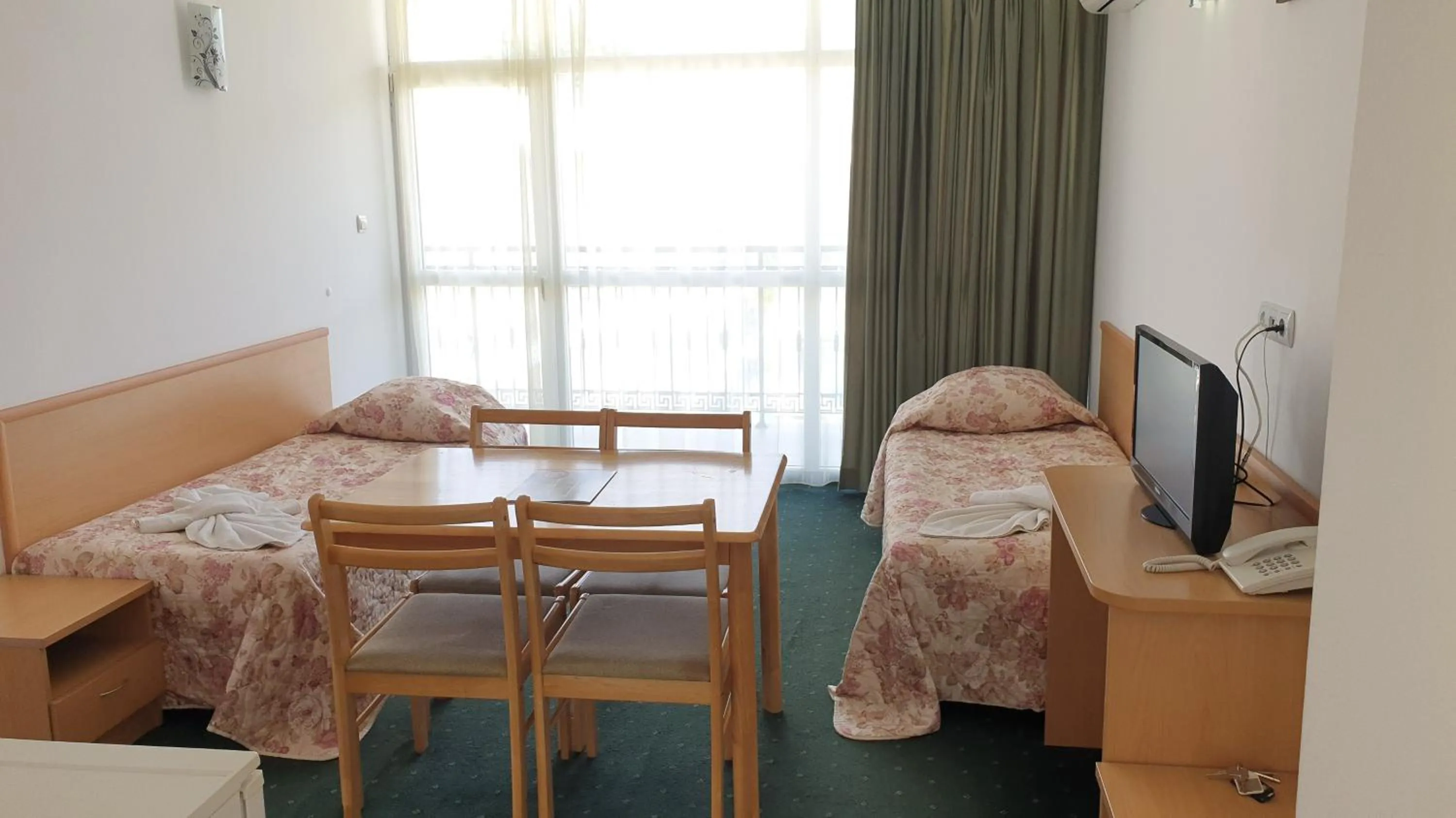 Dining area in Sunny Day Club Hotel