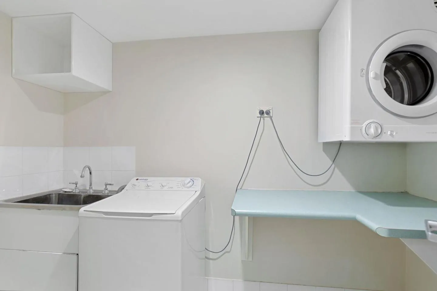 washing machine in White Crest Apartments