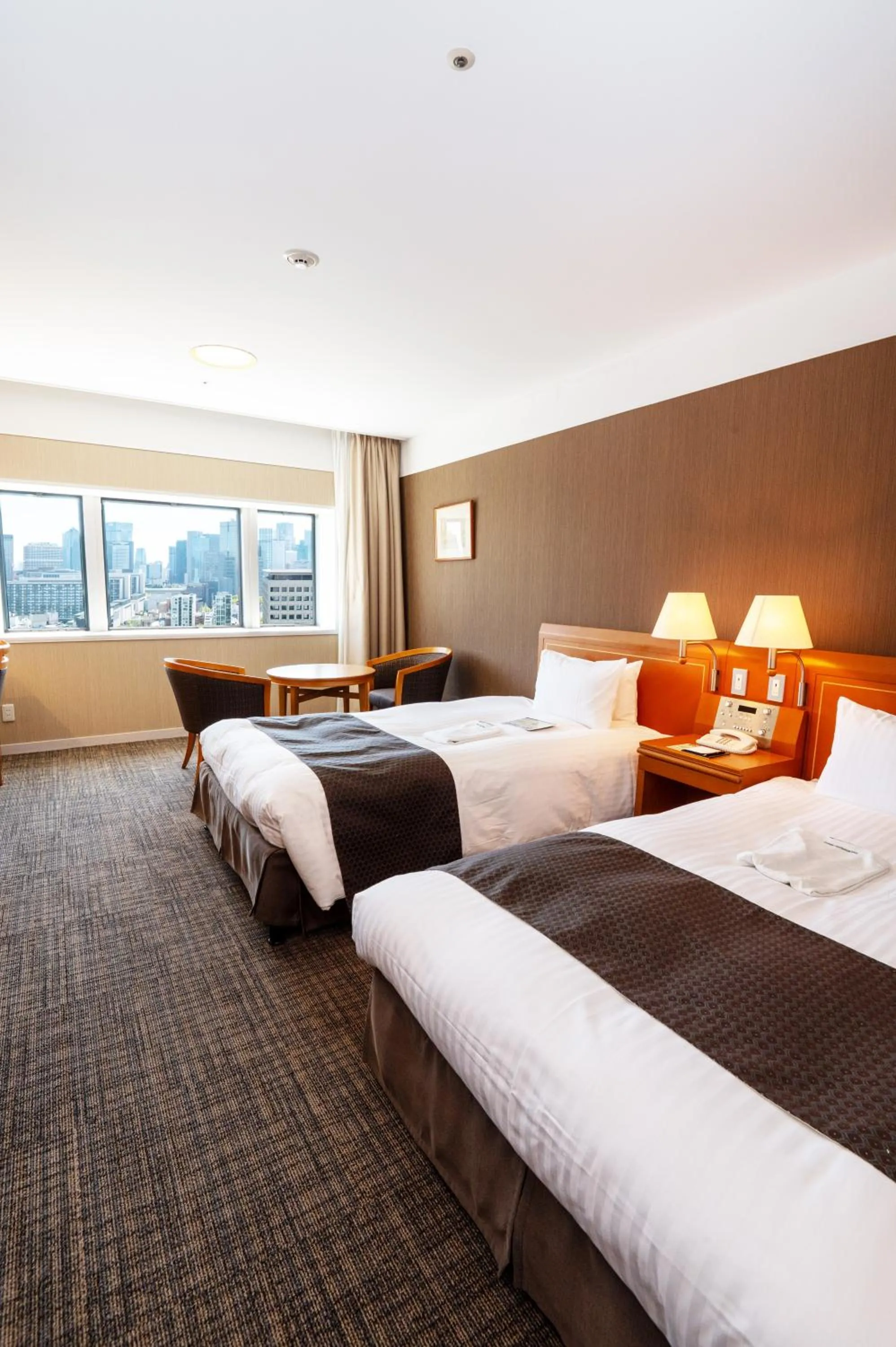 Bed in Toshi Center Hotel