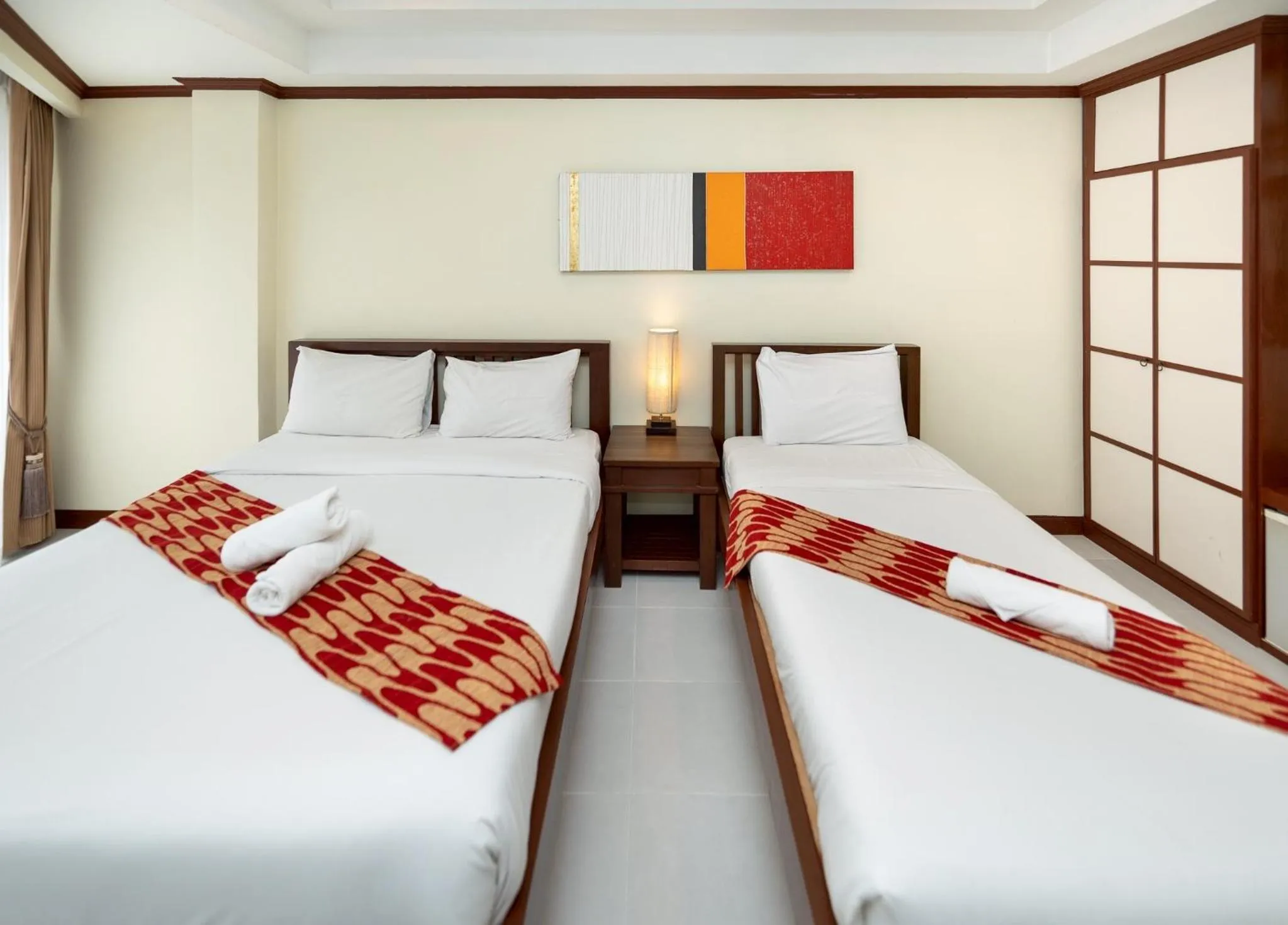 Bed in Khon Kaen Orchid Hotel