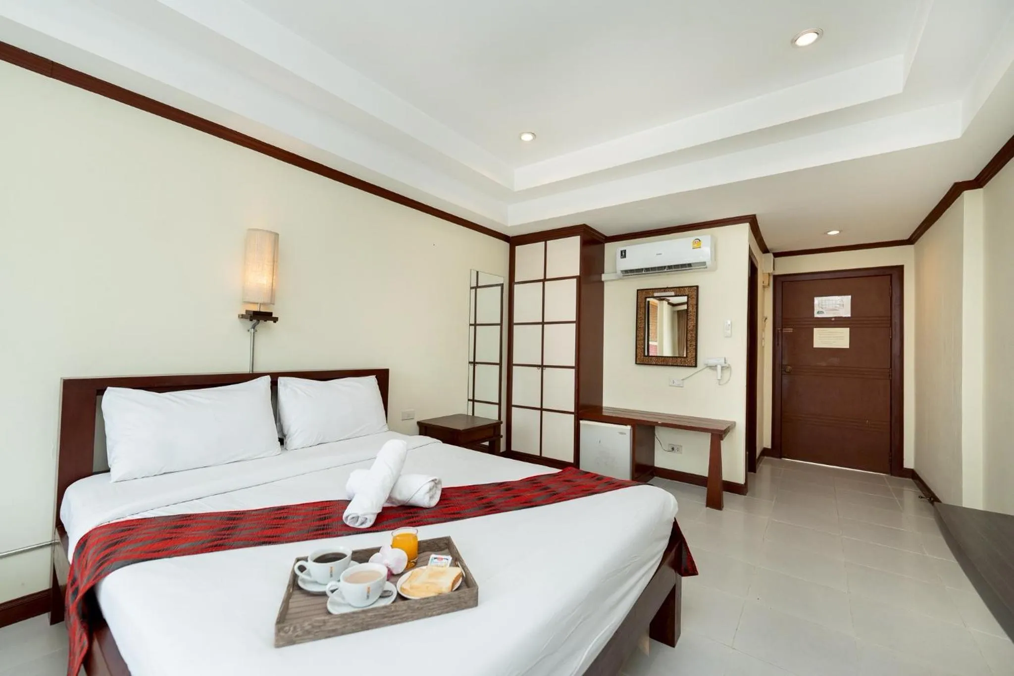 Bed in Khon Kaen Orchid Hotel