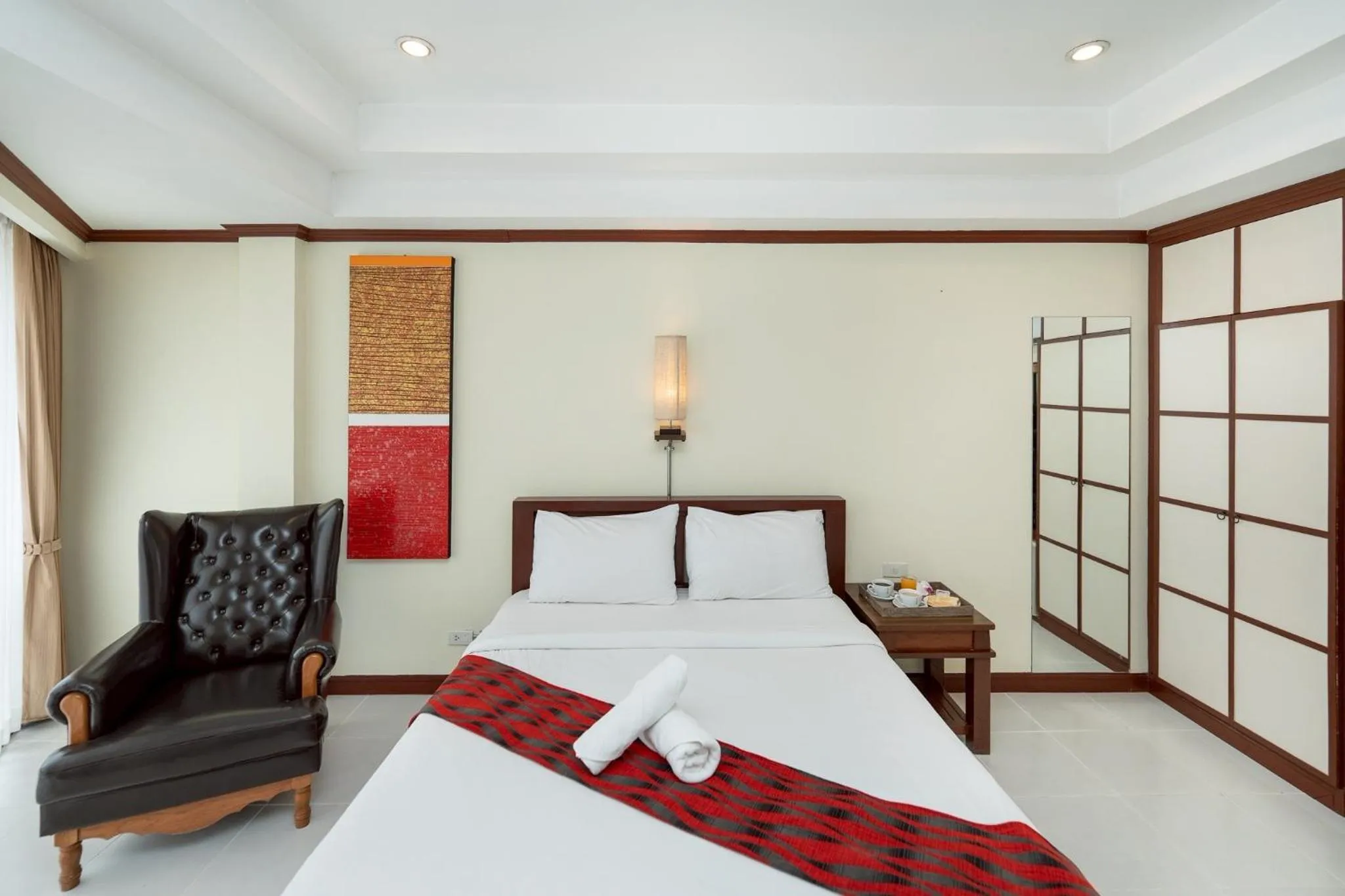 Bed in Khon Kaen Orchid Hotel