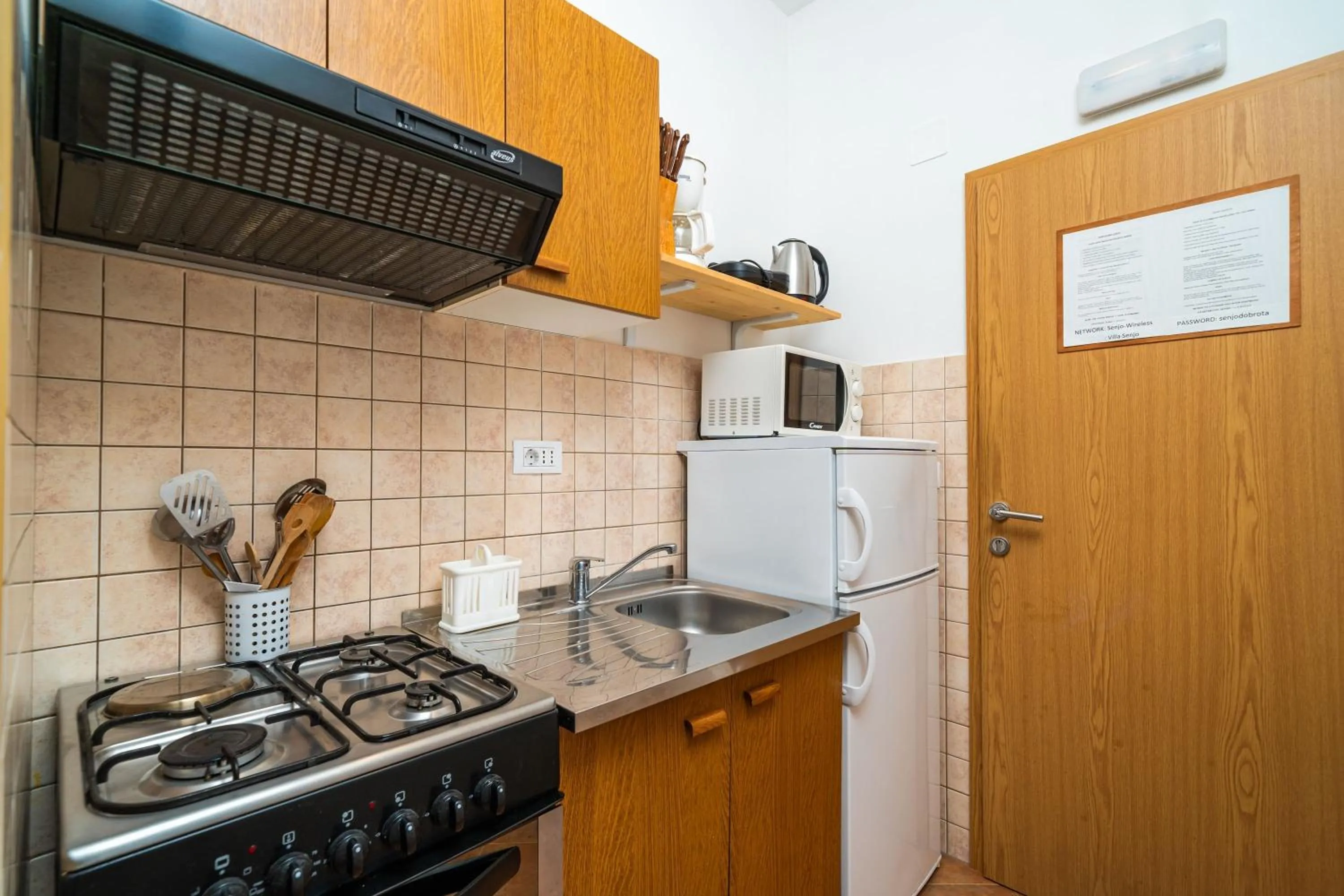 Kitchen or kitchenette in Apartments Senjo