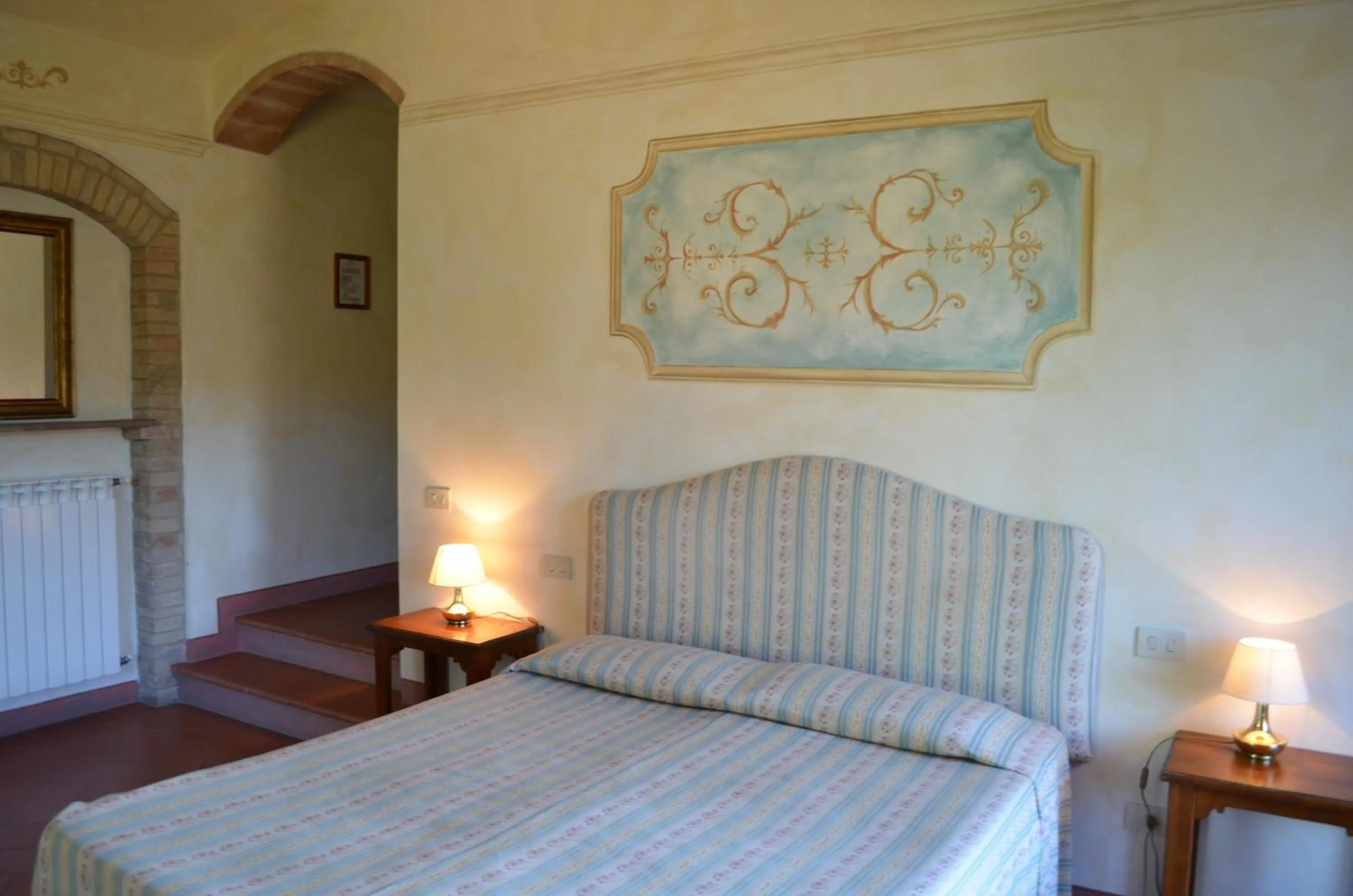 Photo of the whole room, Bed in Rocca degli Olivi