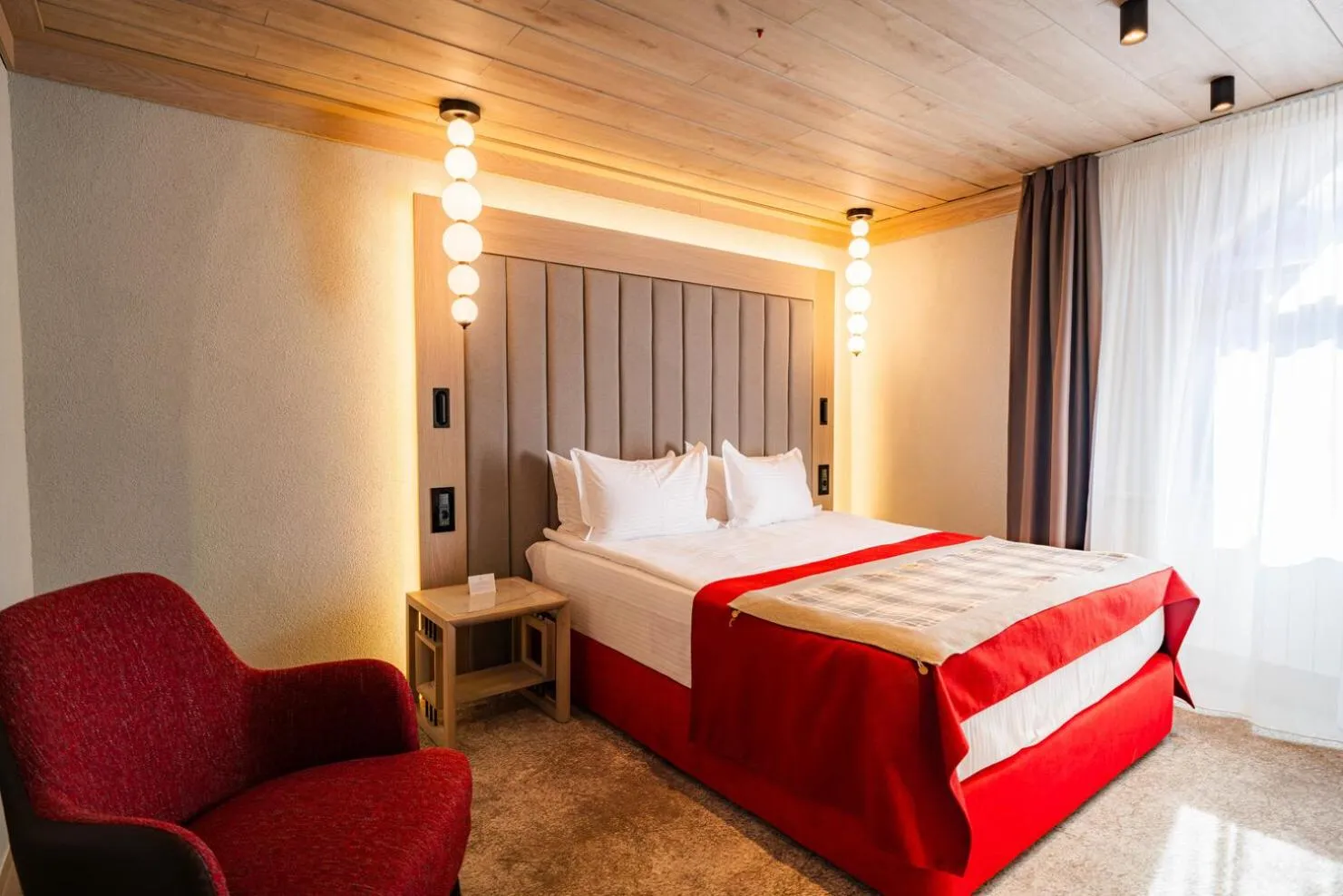 Bed in Alpin Resort Hotel