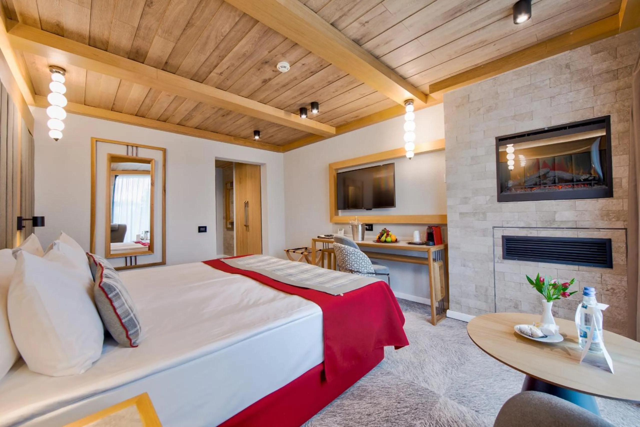 Bed in Alpin Resort Hotel