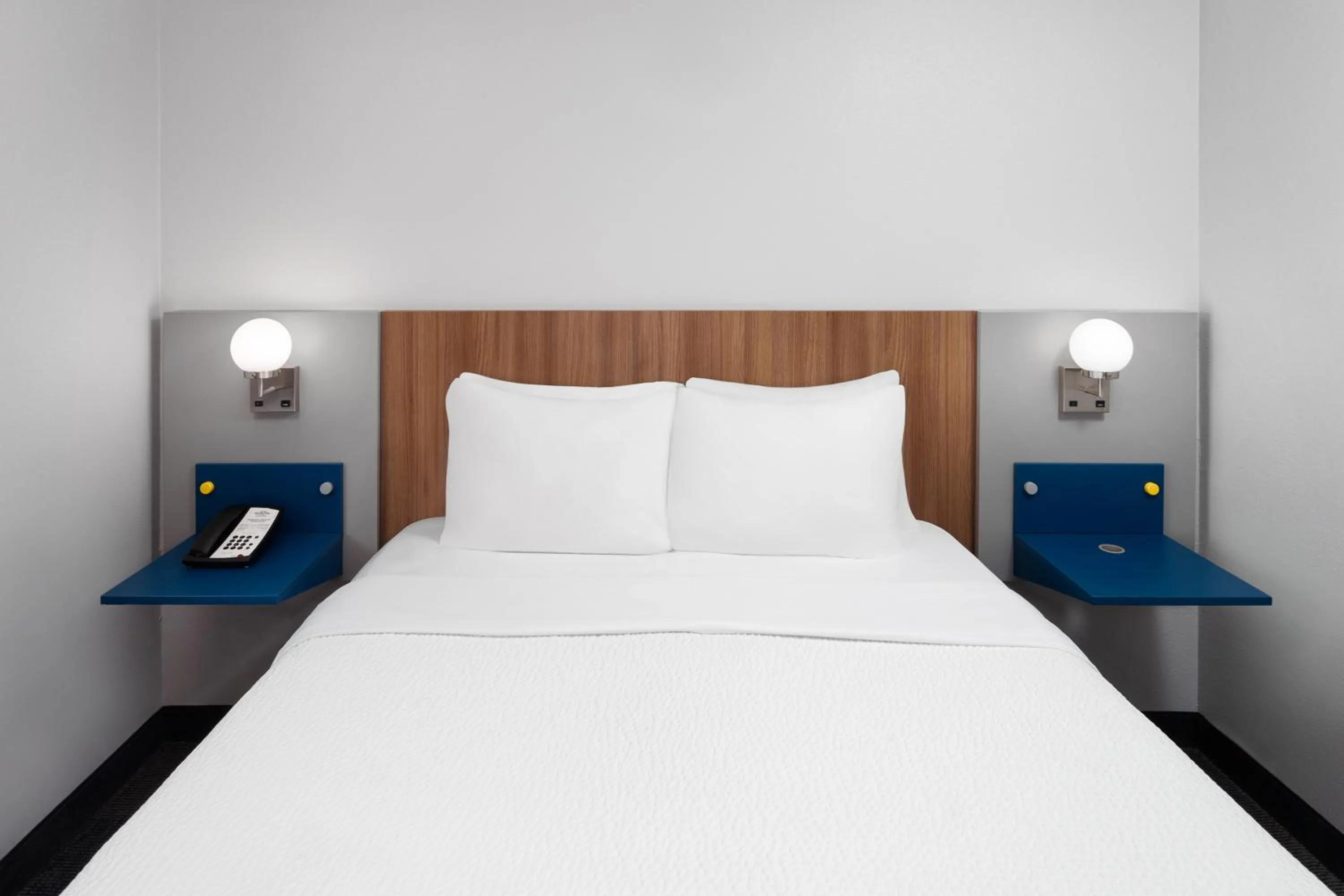 Bed in Microtel Inn by Wyndham Janesville