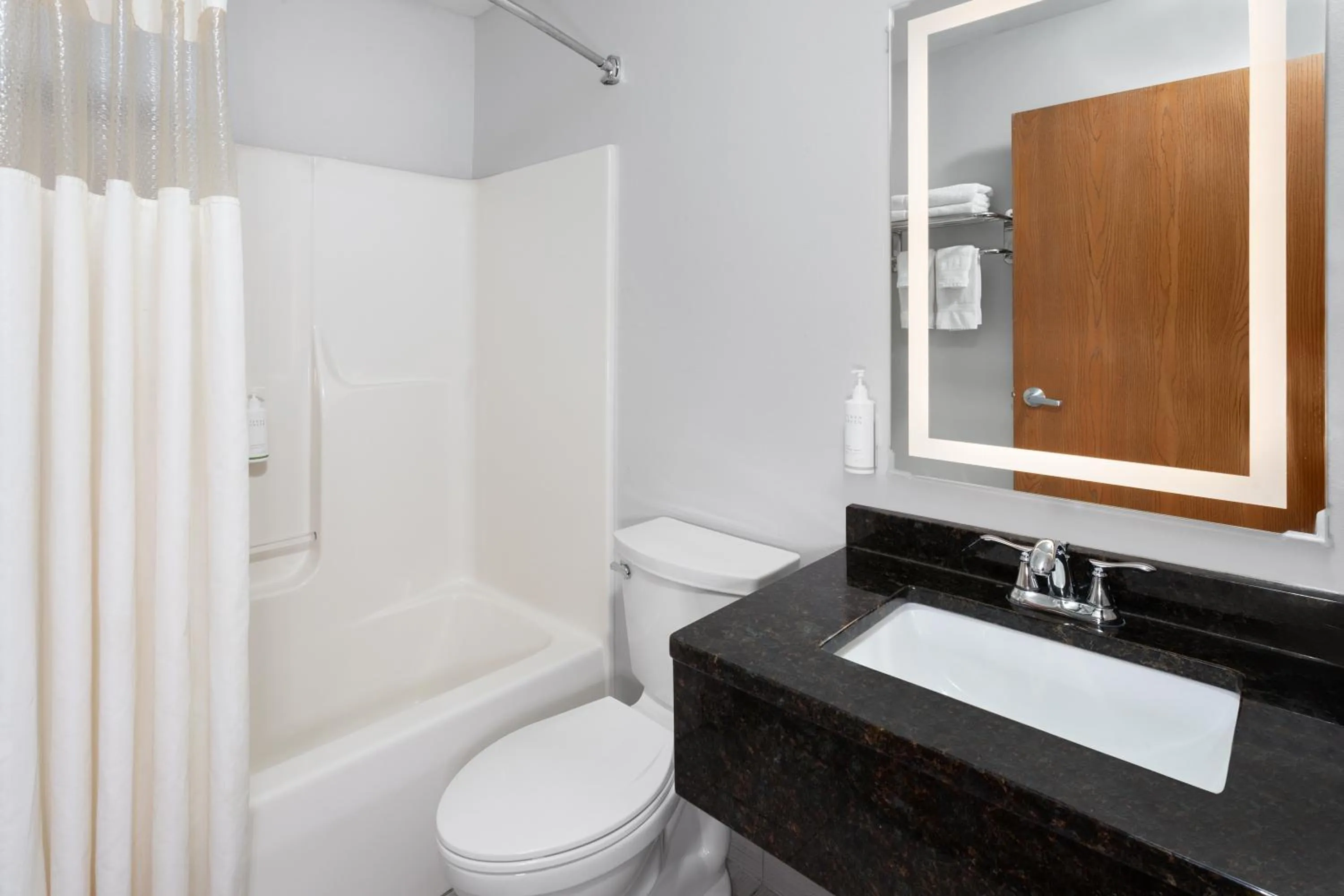 Bathroom in Microtel Inn by Wyndham Janesville