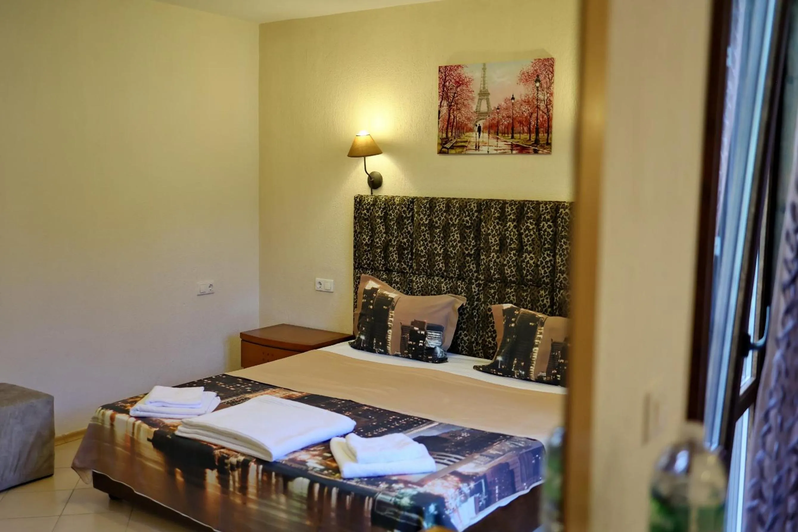 Bed in Elli Greco Hotel