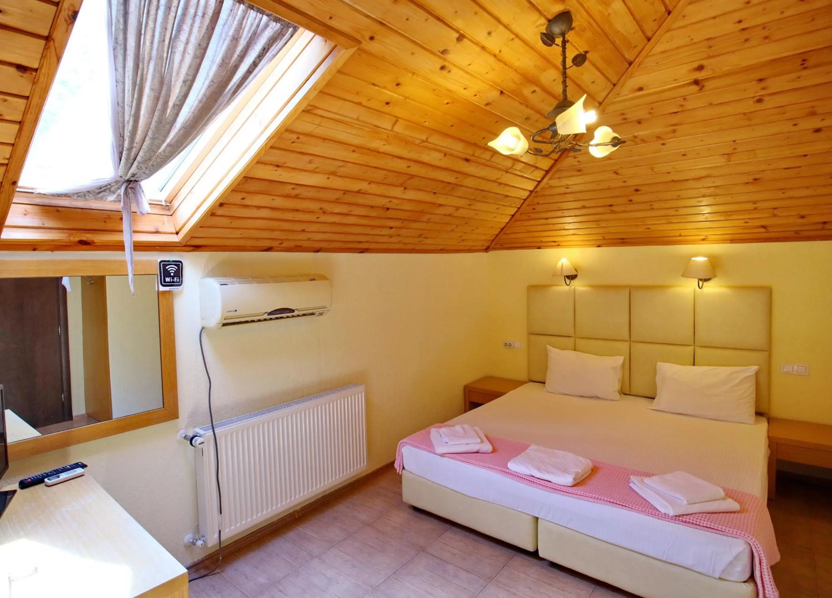 Bed in Elli Greco Hotel