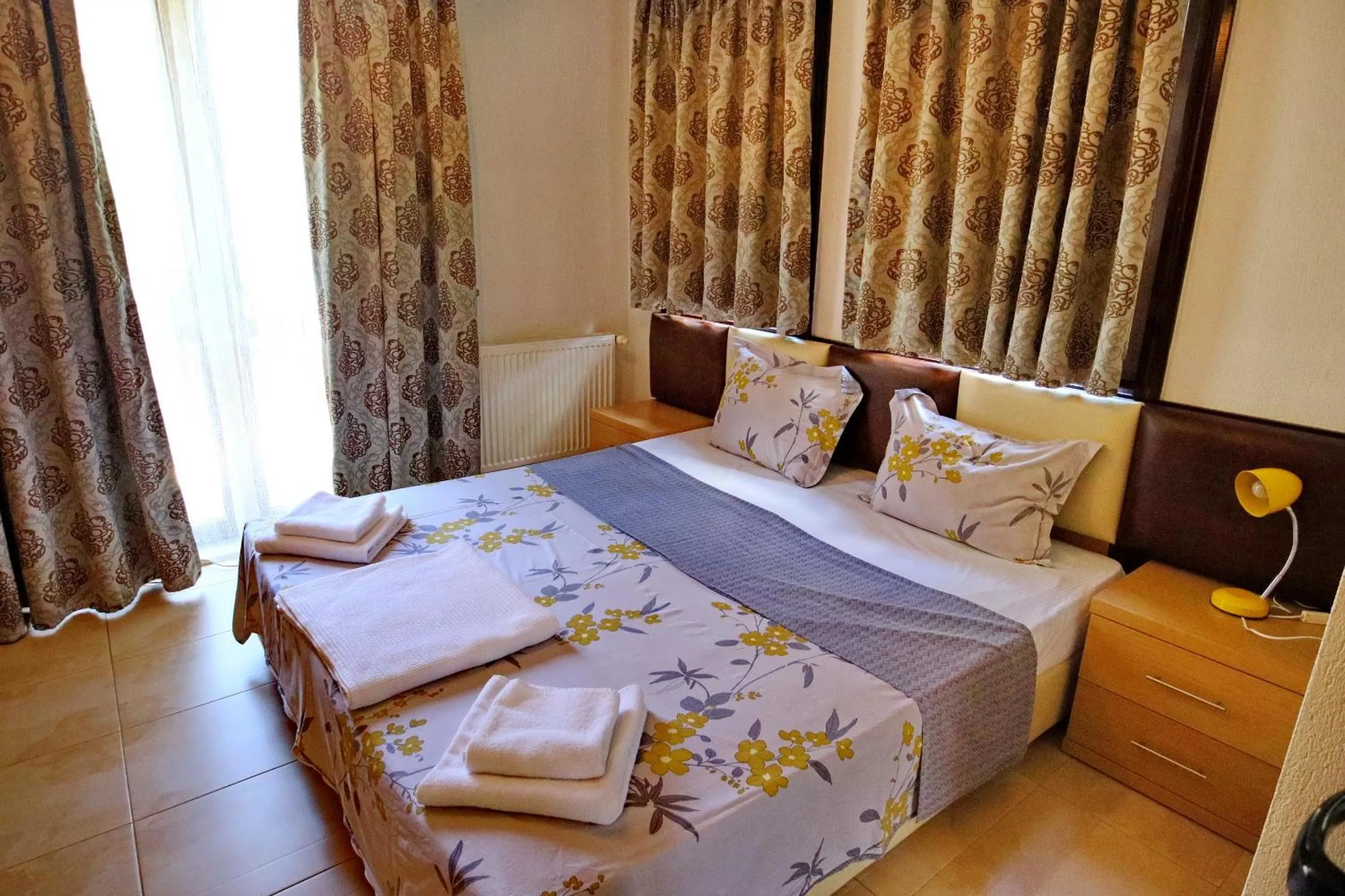 Bed in Elli Greco Hotel