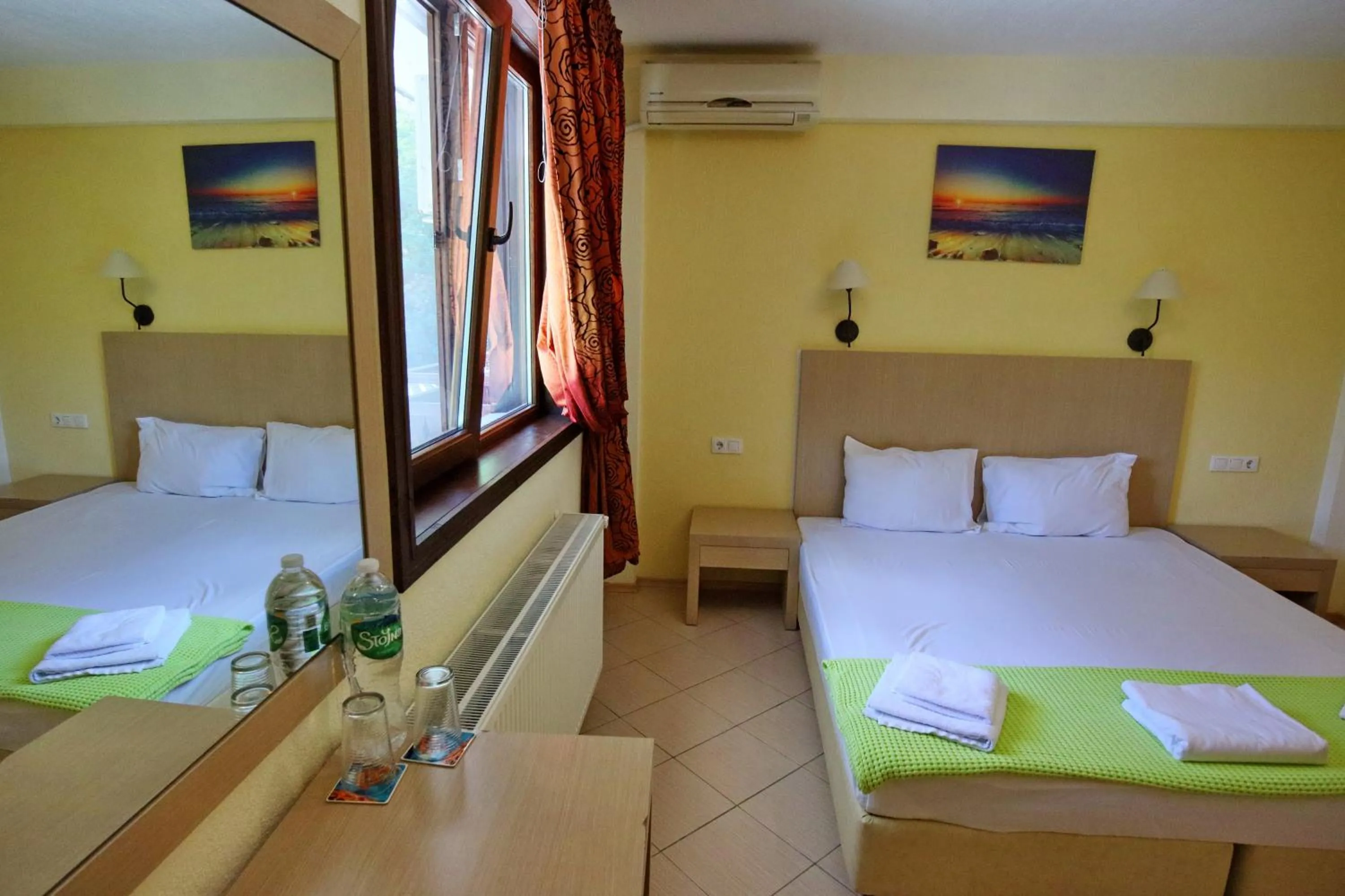 Bed in Elli Greco Hotel