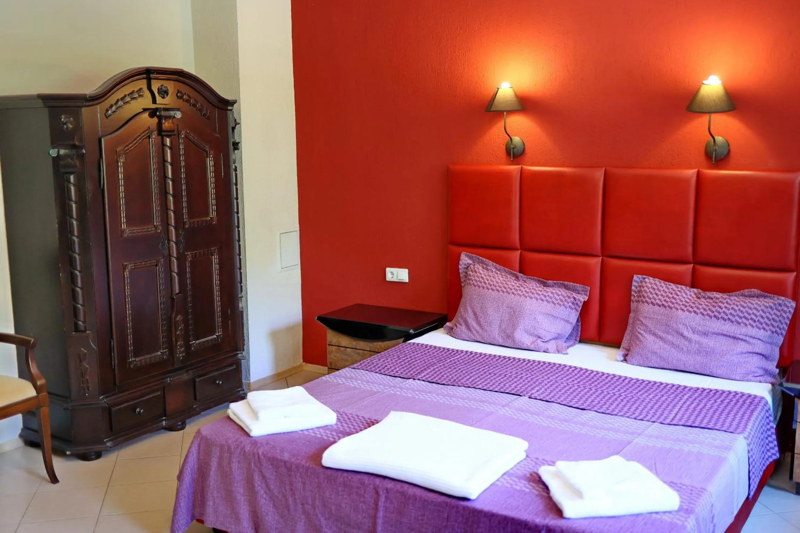 Bed in Elli Greco Hotel