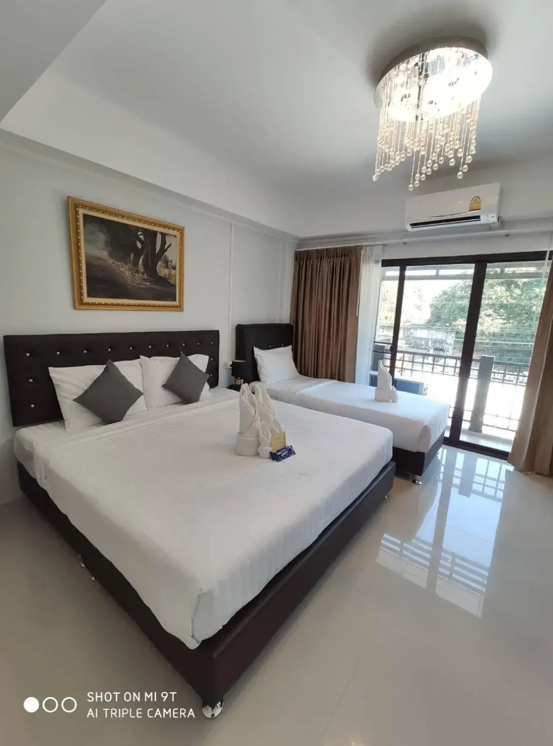 Triple Room in Bann Tawan Hostel Chiang Rai Triple Room in Bann Tawan Hostel Chiang Rai