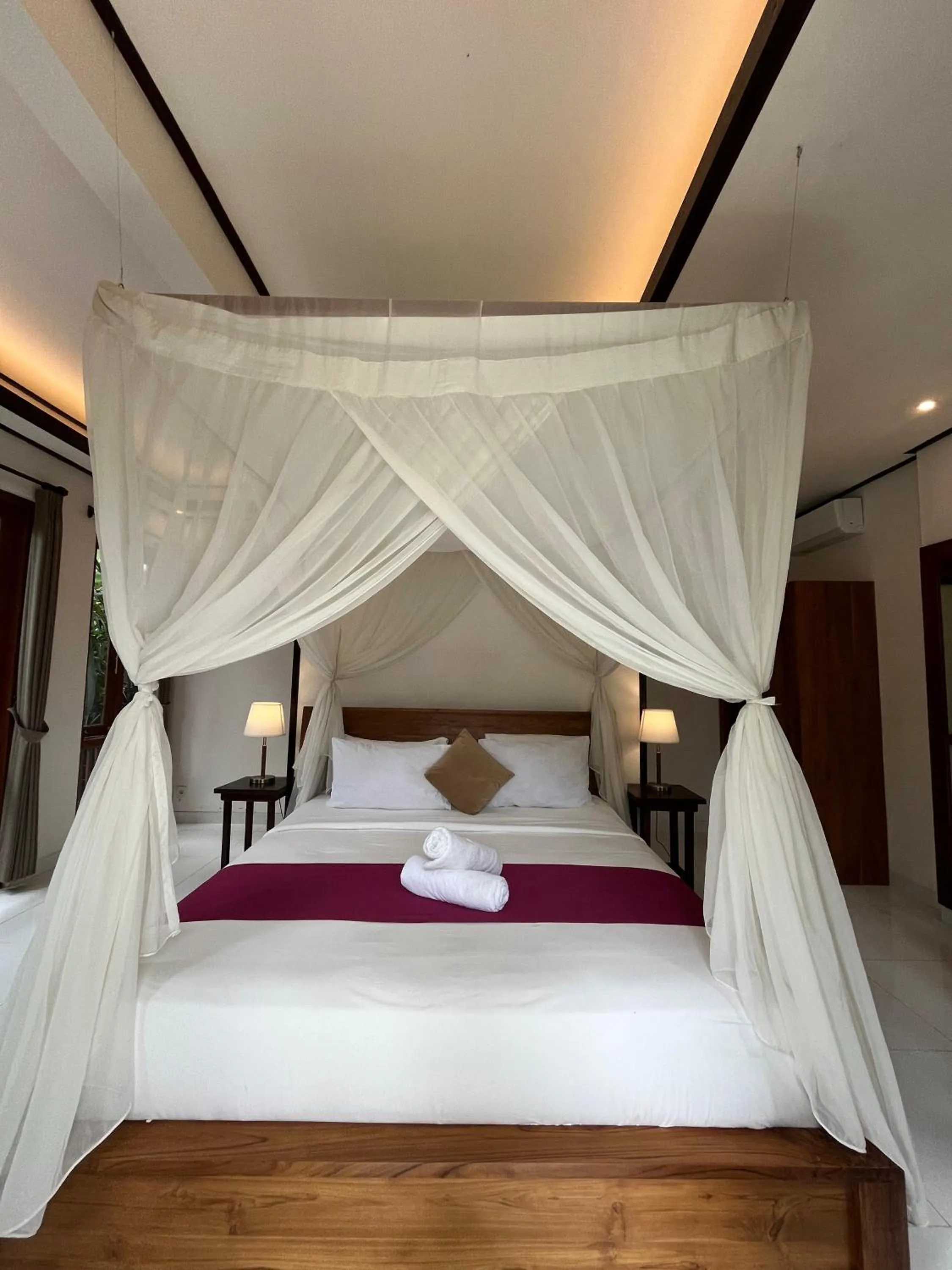 Bed in Gusde Tranquil Villas by EPS