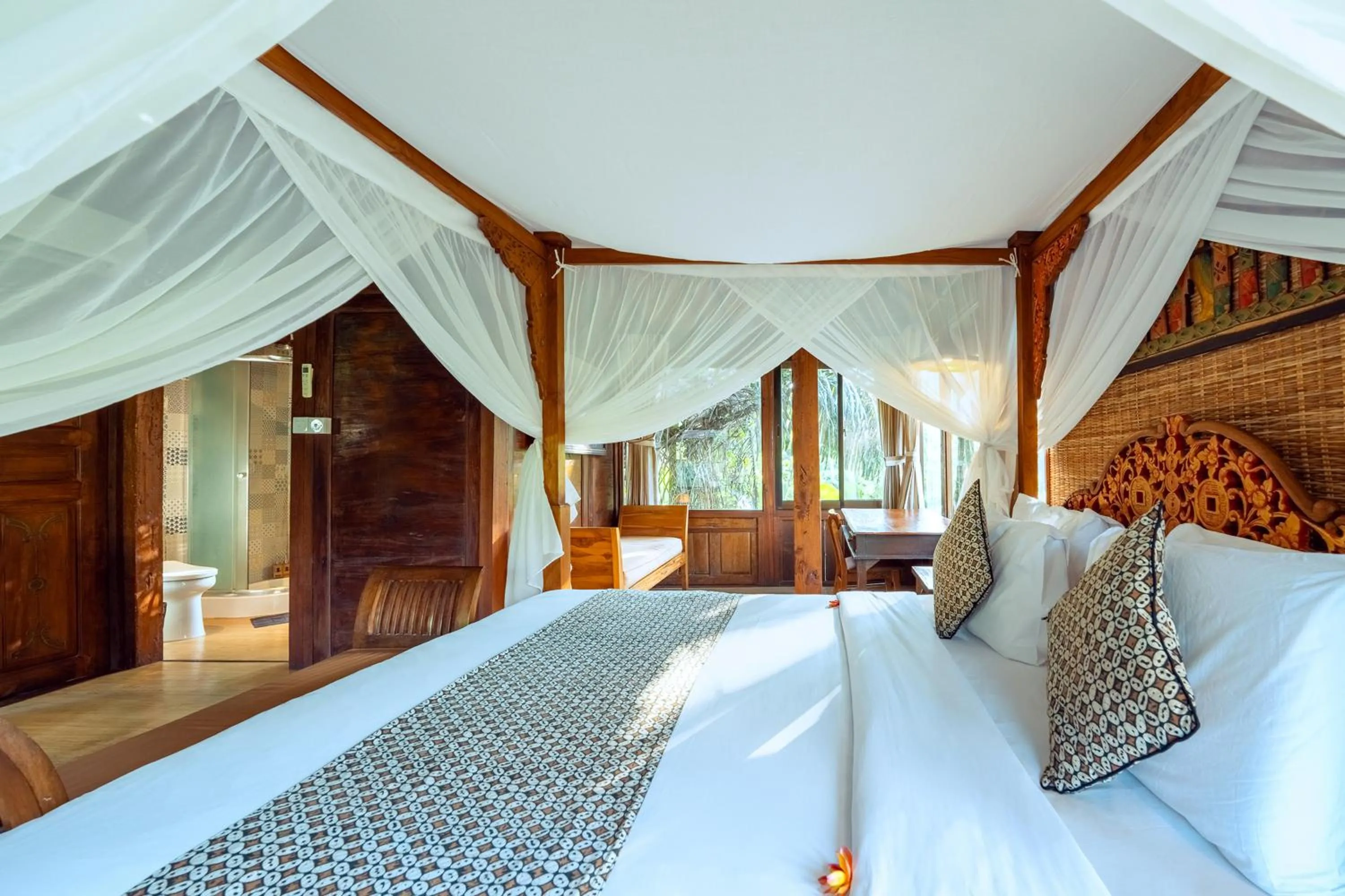 Bed in Gusde Tranquil Villas by EPS