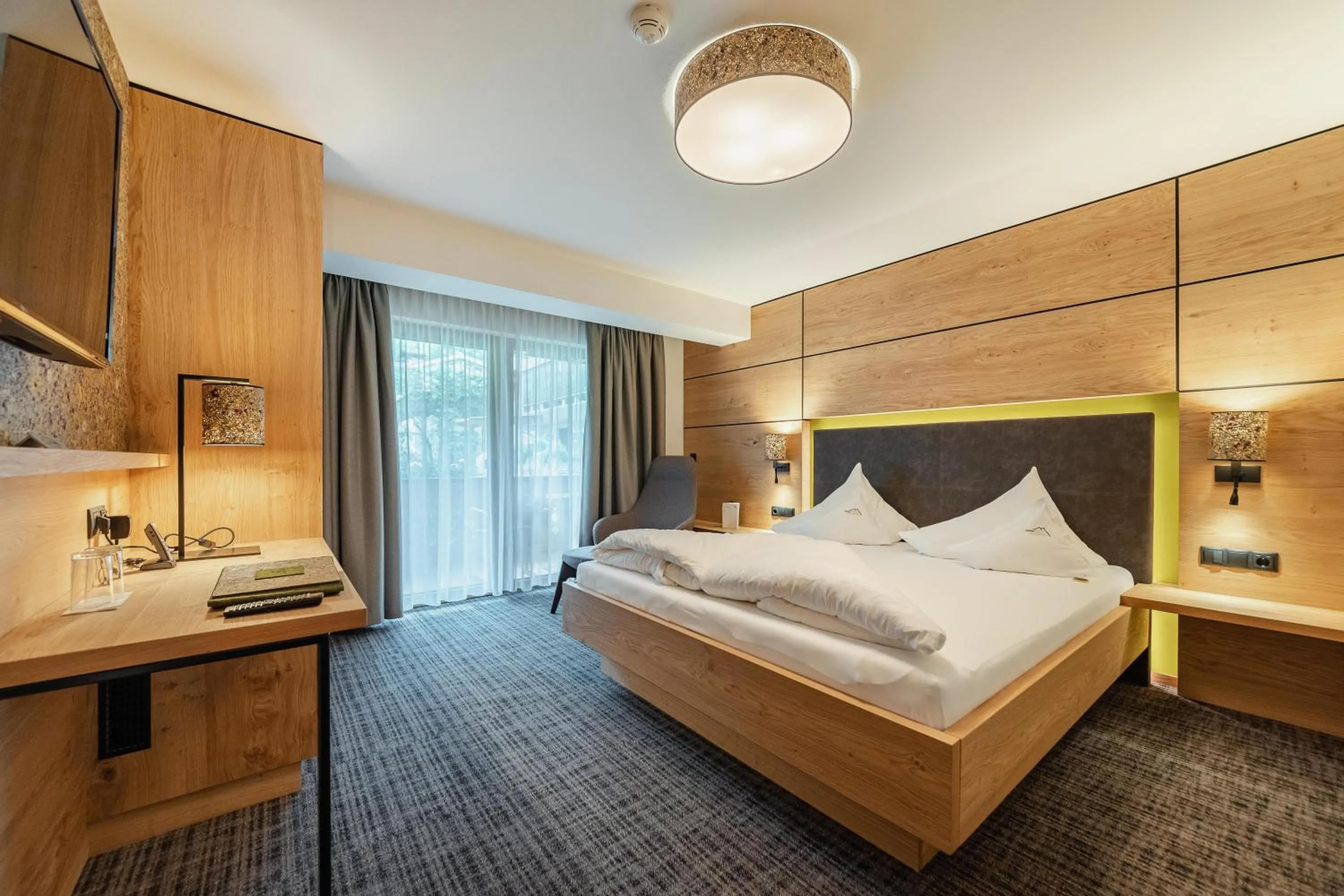 Bed in Kräuterhotel Hochzillertal