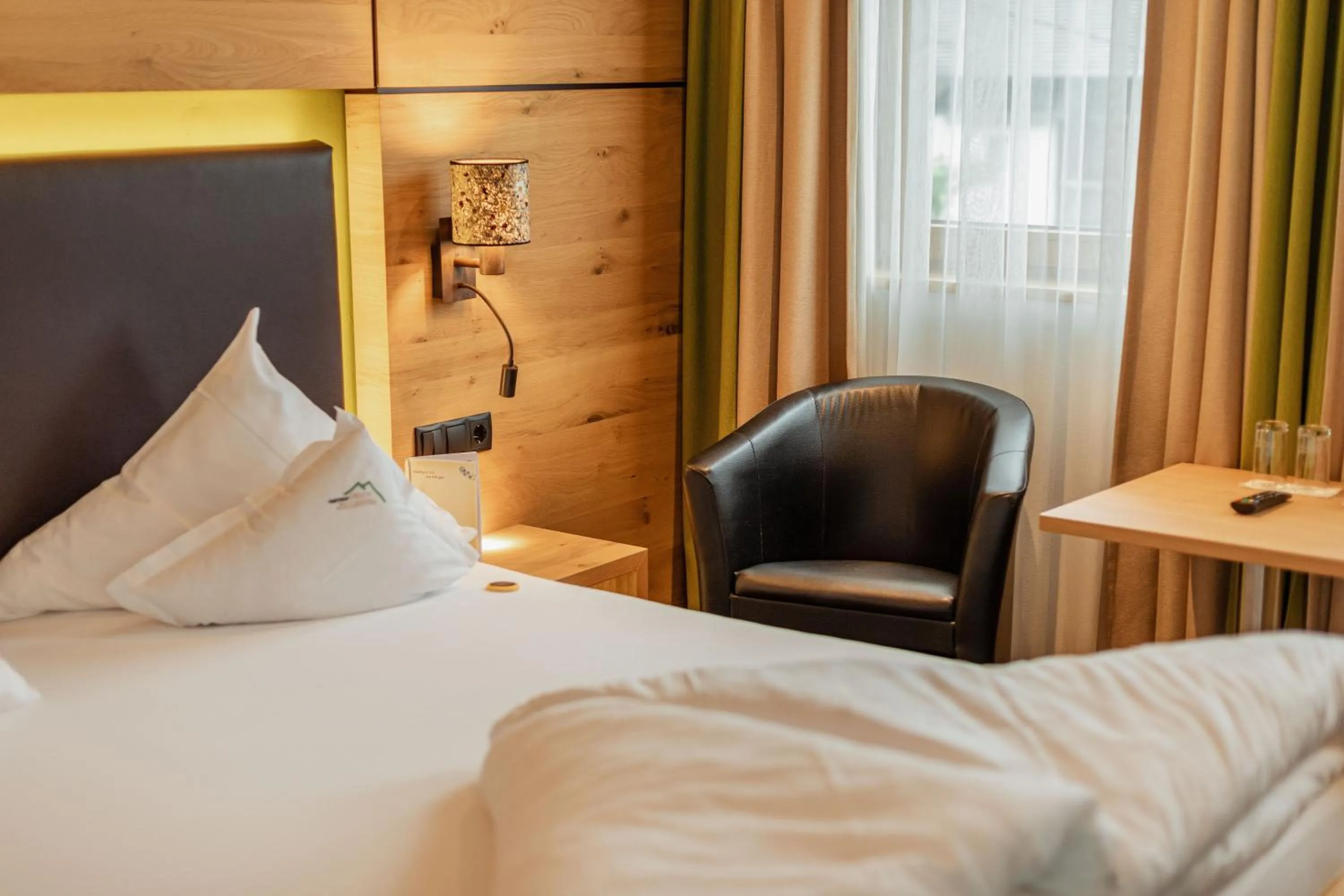 Bed in Kräuterhotel Hochzillertal