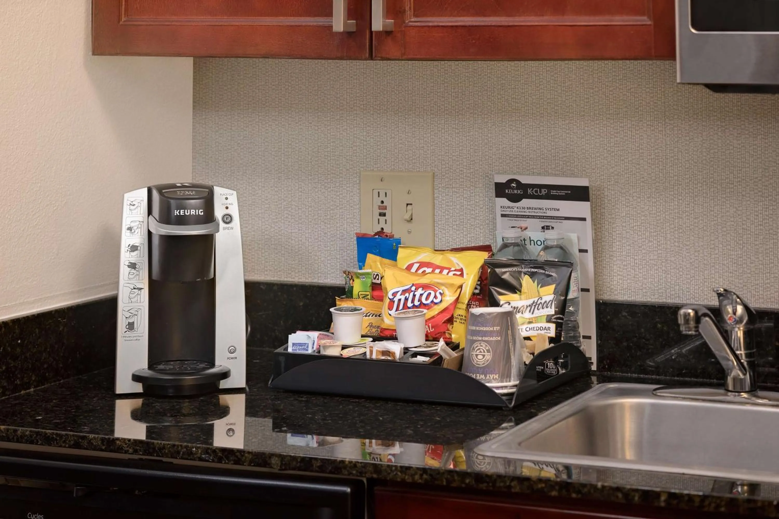 Kitchen or kitchenette in Homewood Suites by Hilton Orlando Maitland