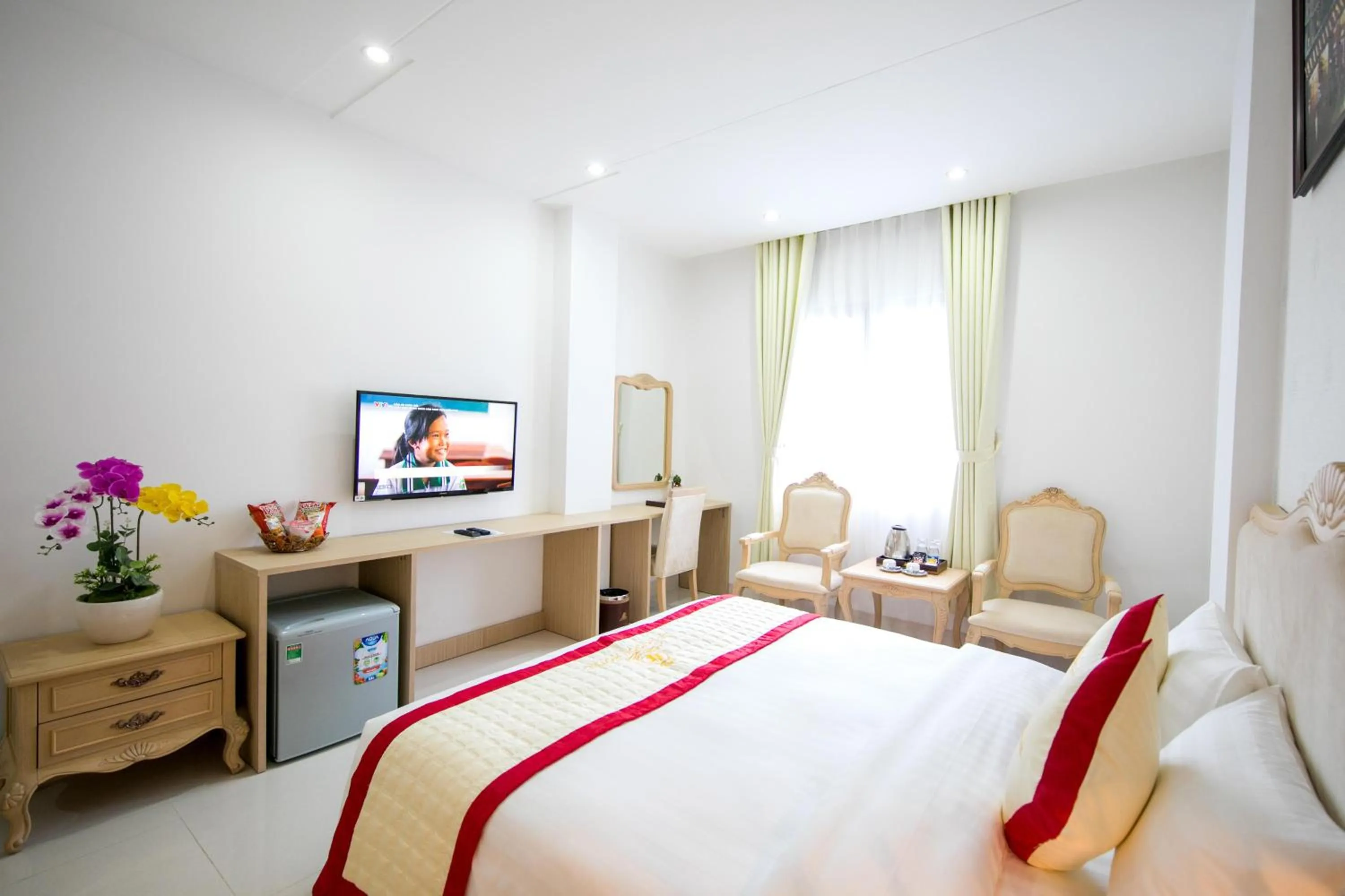 Bed in Le Saigon Hotel