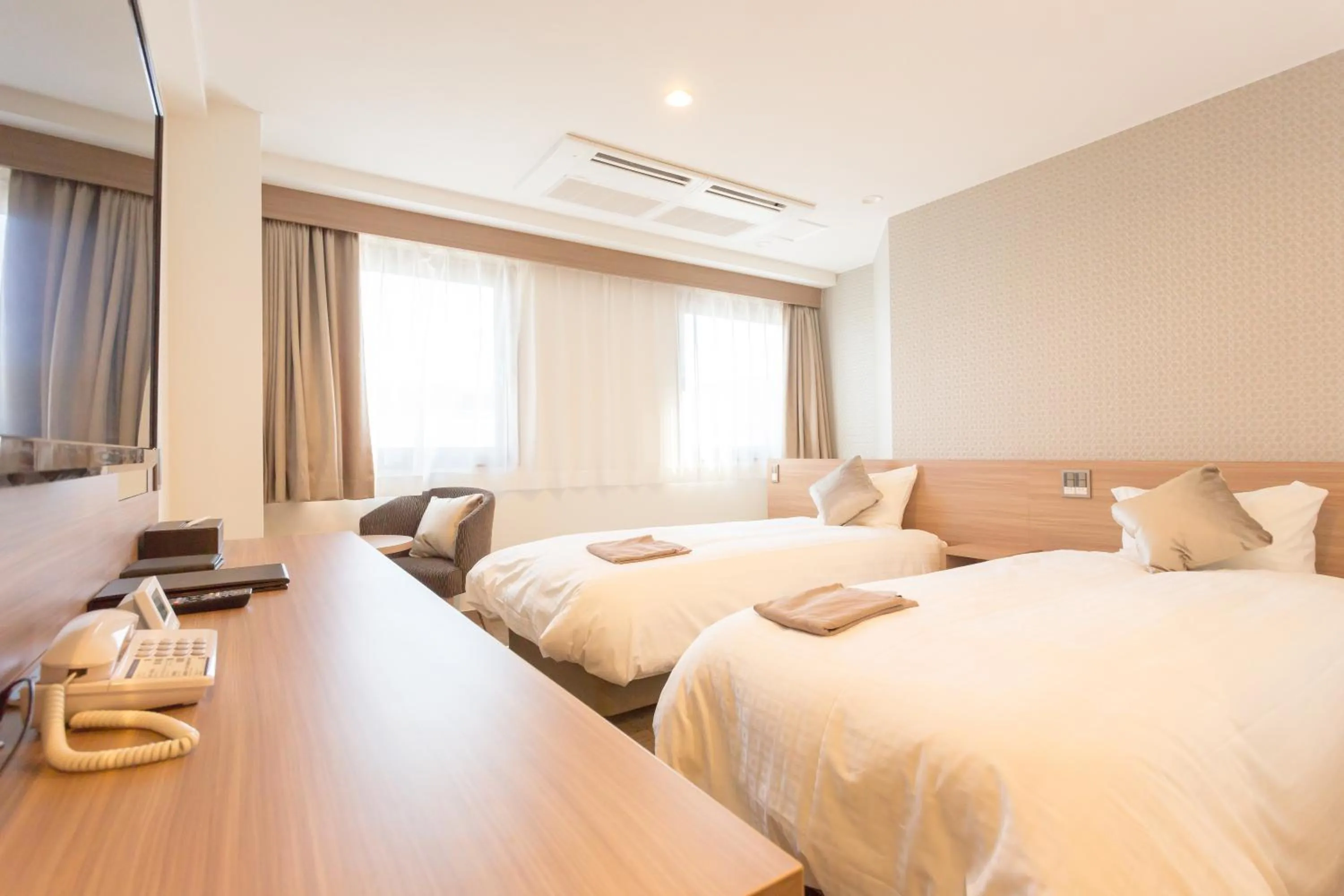 Bed in Shimizu City Hotel