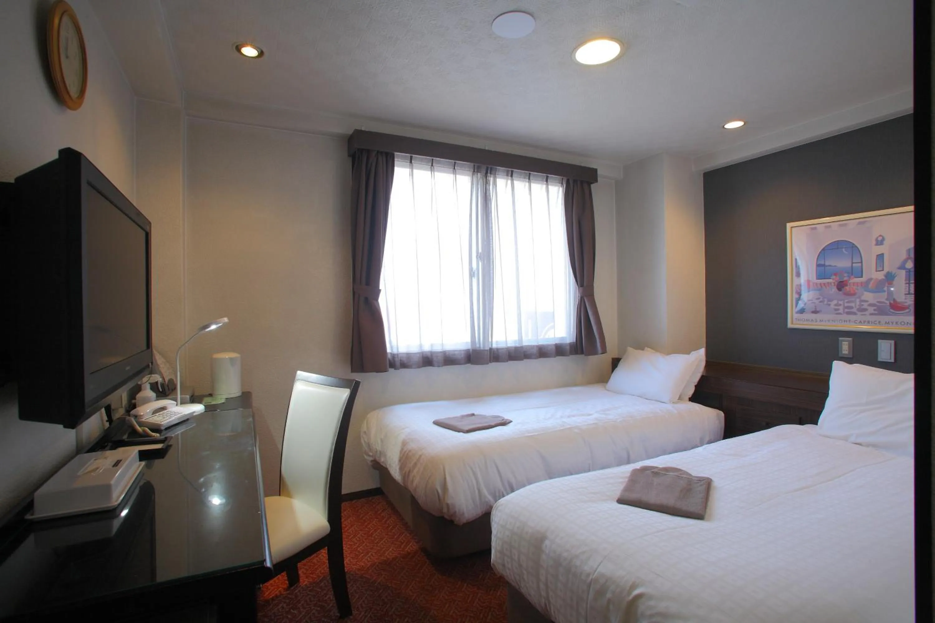 Bed in Shimizu City Hotel