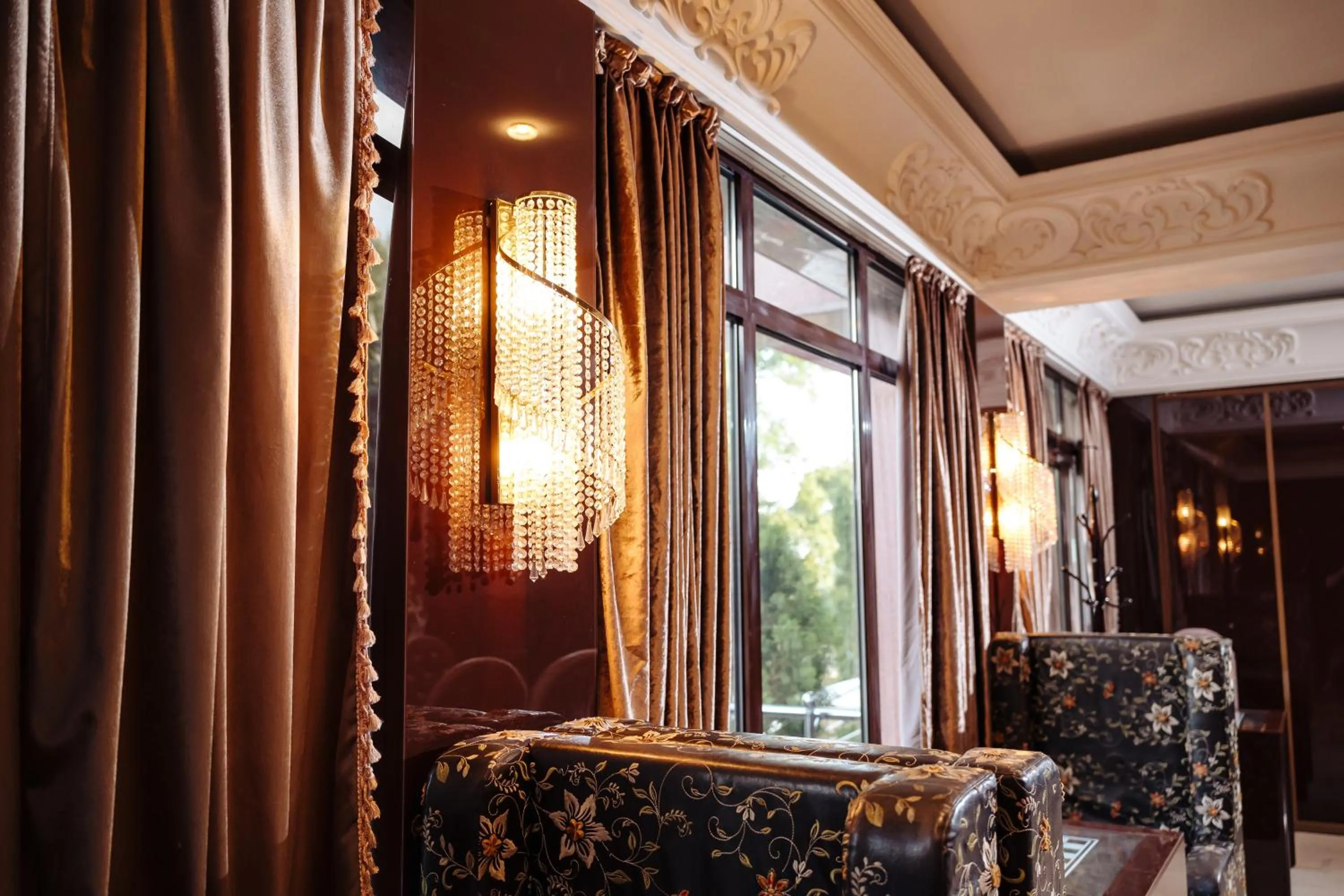 Seating area in Maxim Pasha Hotel