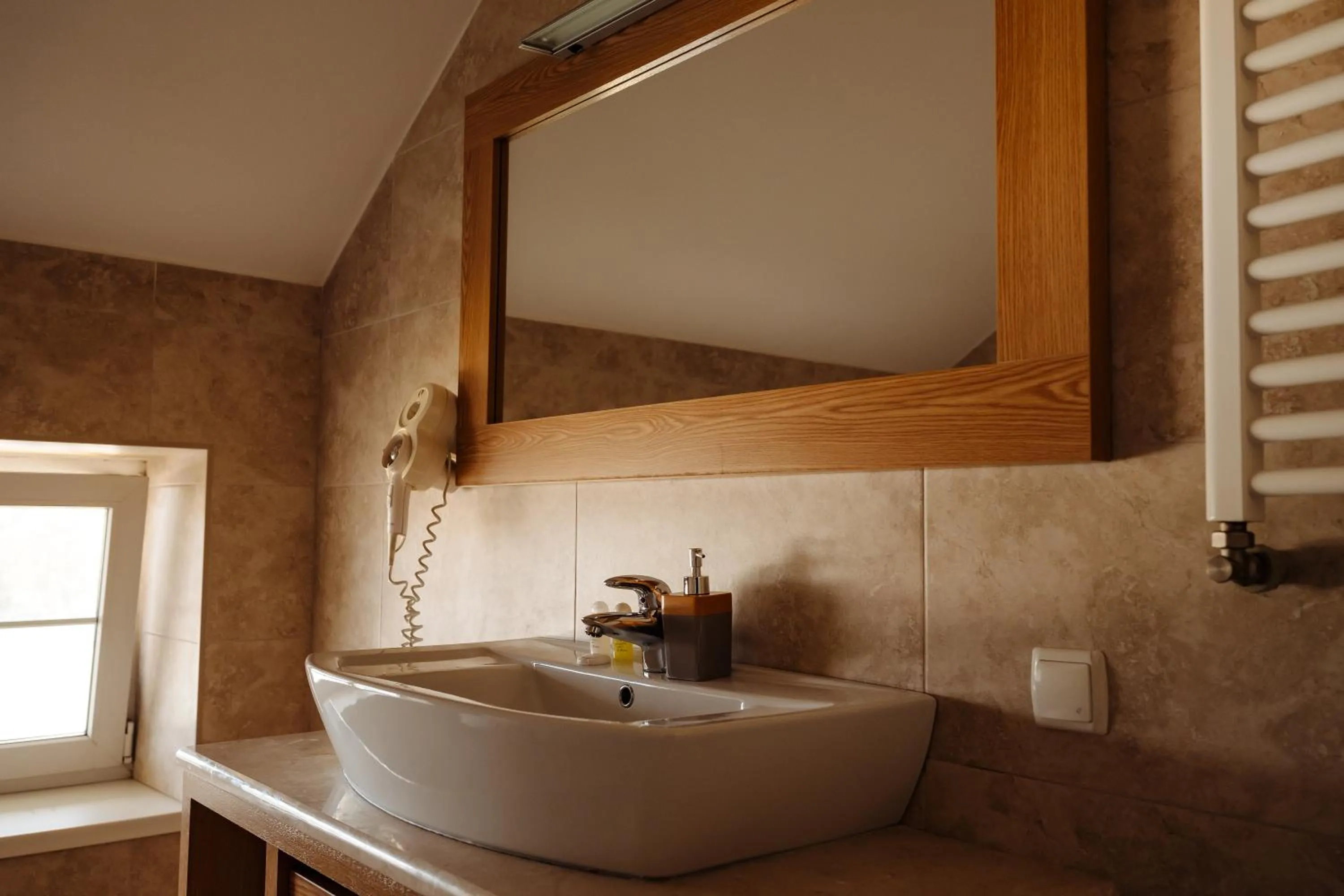 Bathroom in Maxim Pasha Hotel