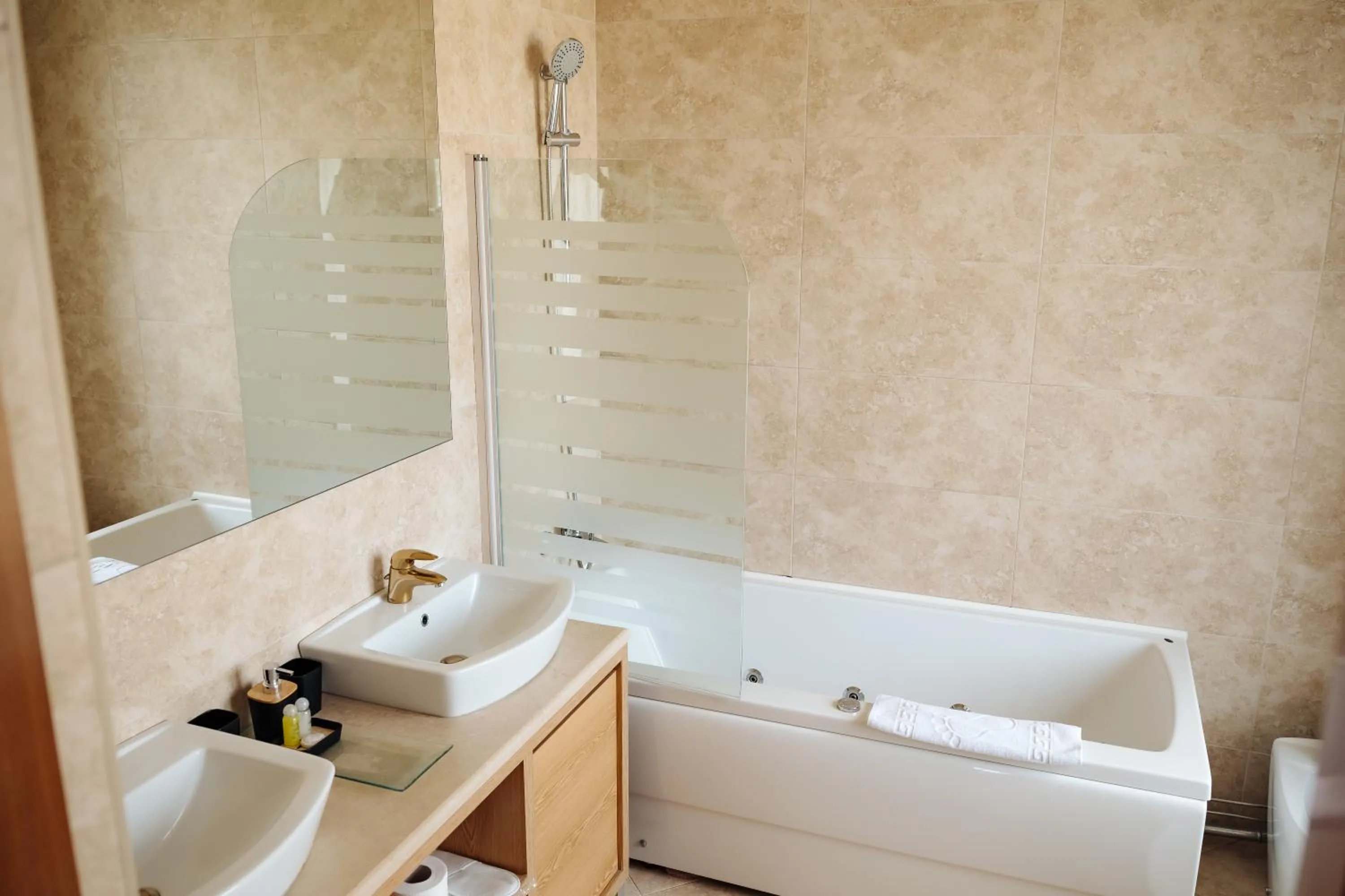 Bathroom in Maxim Pasha Hotel