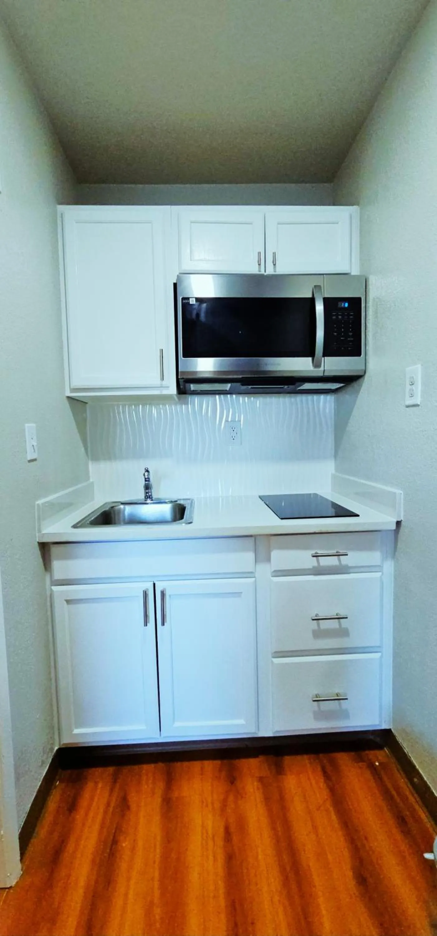 Kitchen or kitchenette in Avera Suites