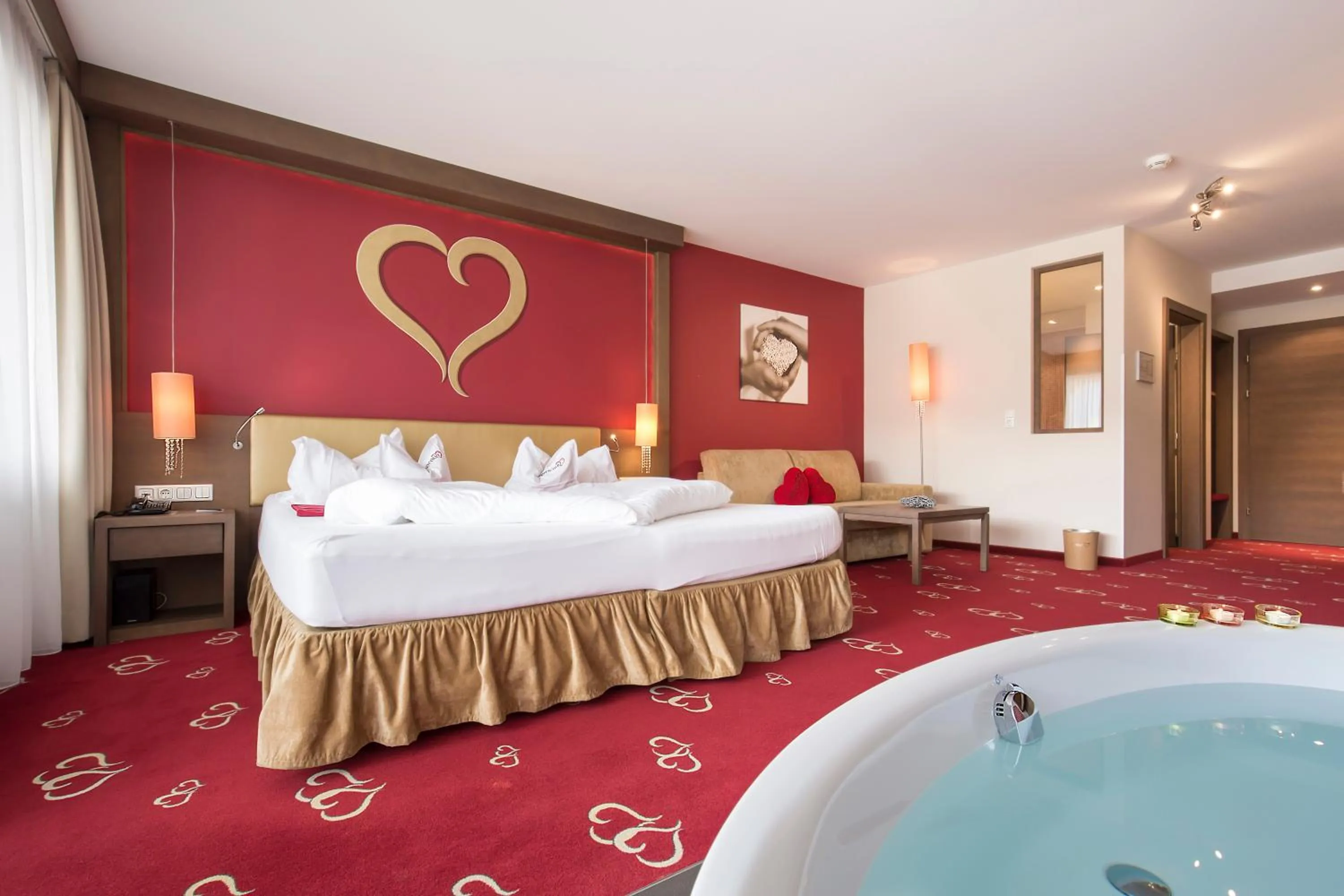 Photo of the whole room, Bed in Alpen-Herz Romantik & Spa - Adults Only