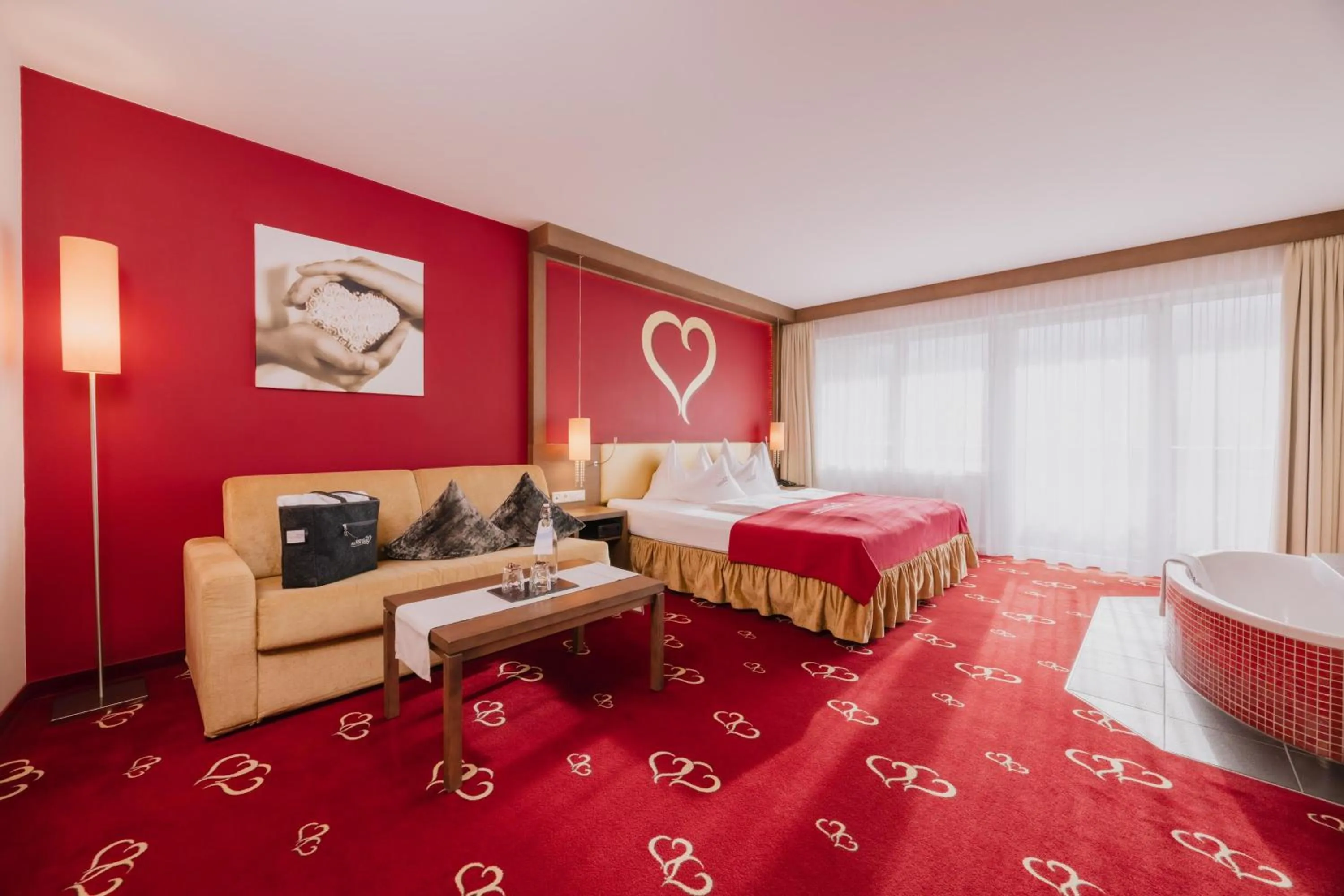 Photo of the whole room, Bed in Alpen-Herz Romantik & Spa - Adults Only